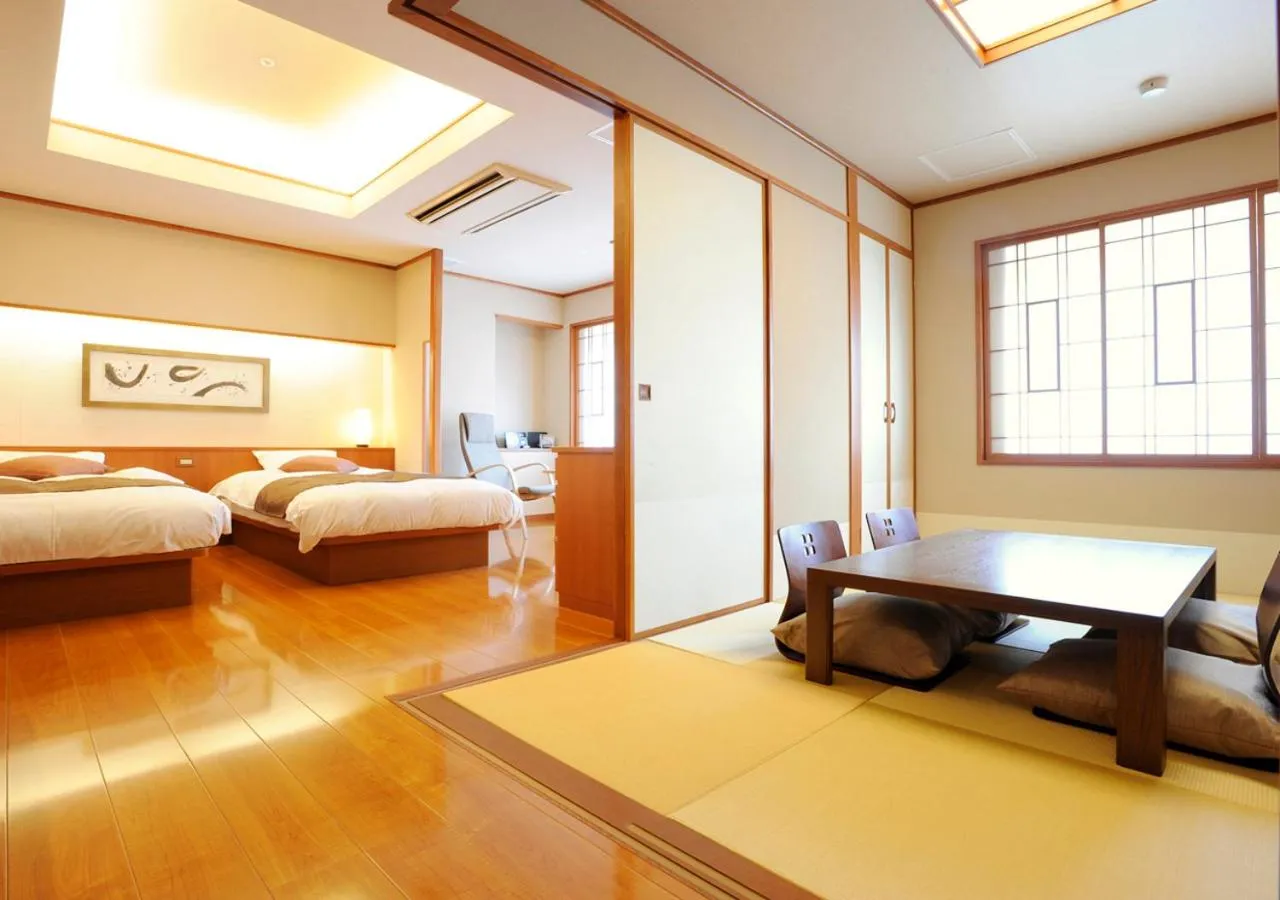 Photo of the whole room, Bed in Hotel Taisetsu Onsen&Canyon Resort