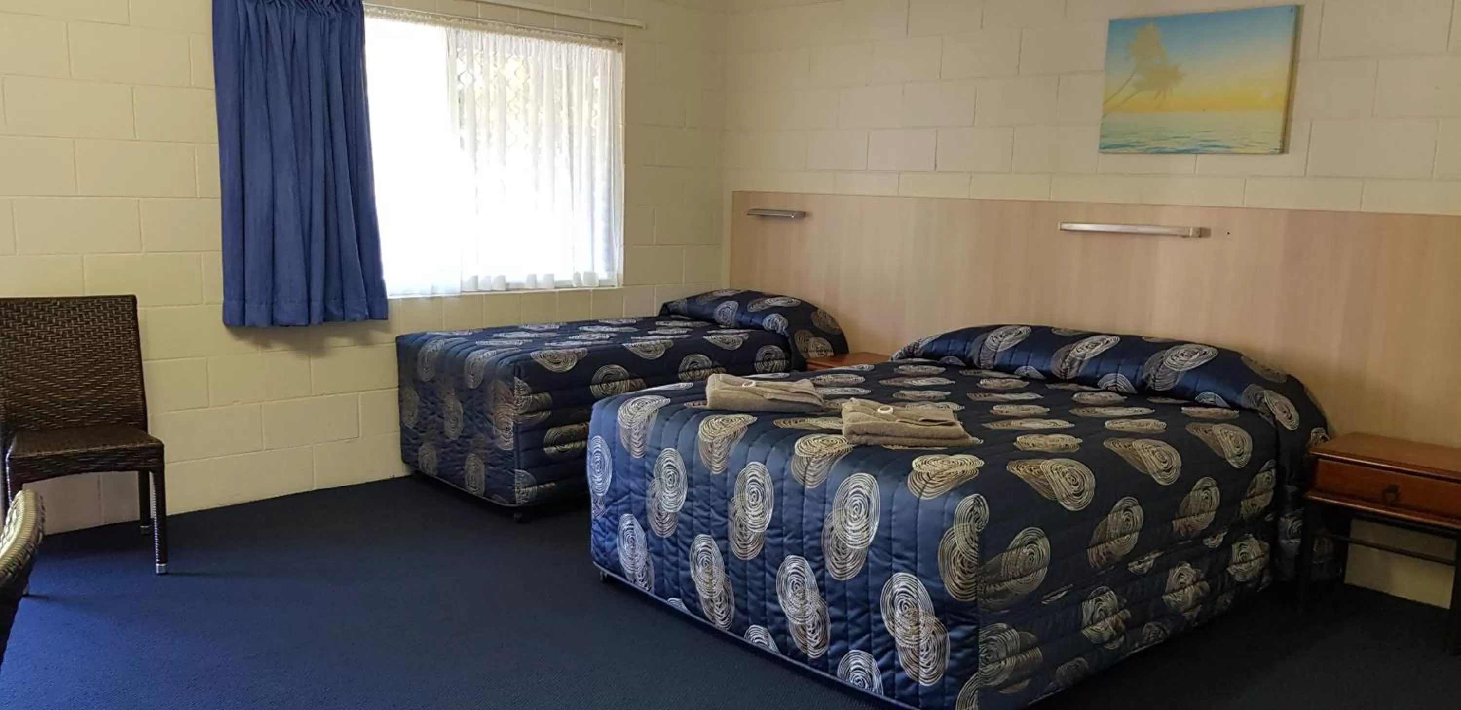 Bed in Mango Tree Motel