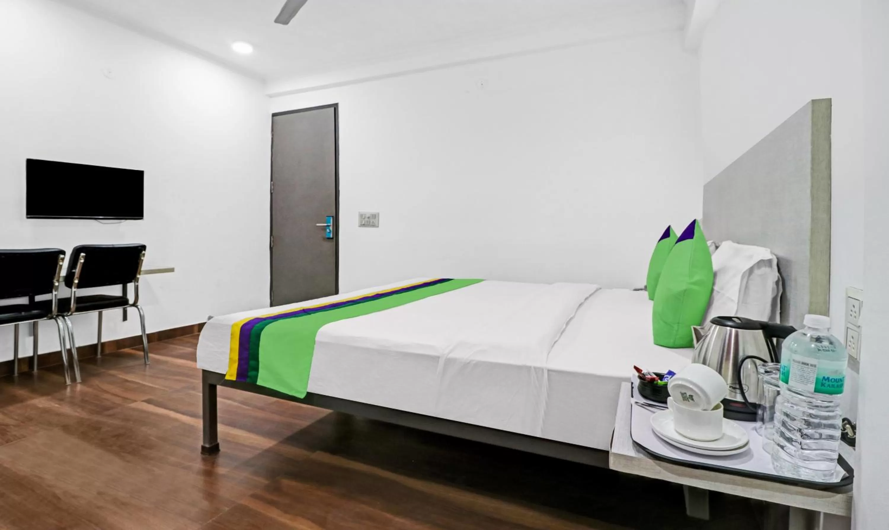 Bedroom, Bed in Treebo Grand Town House