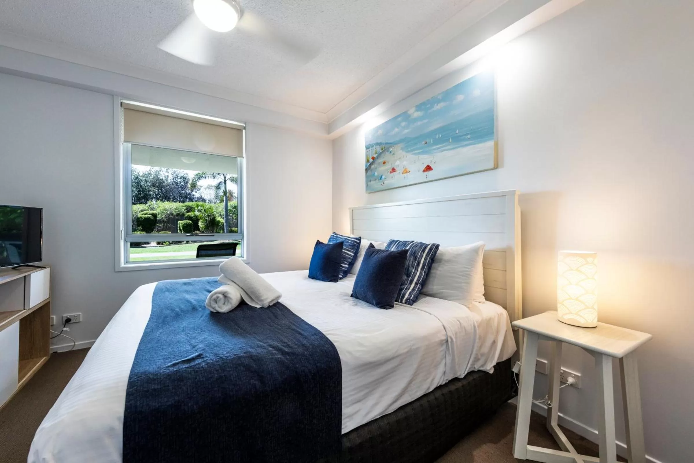 Bed in Pacific Marina Apartments