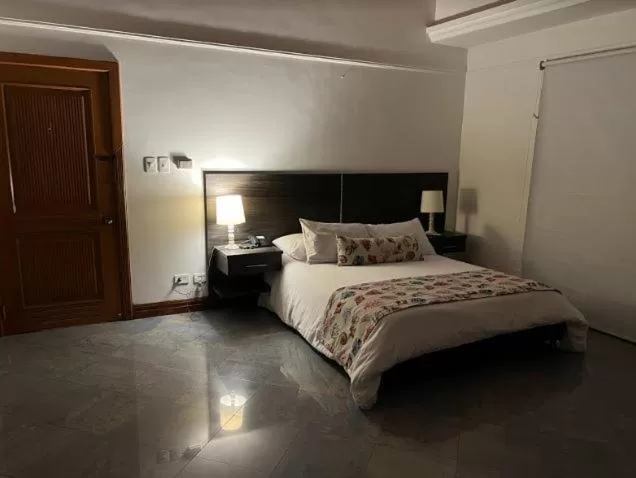 Bed in Porto Bello Hotel Boutique