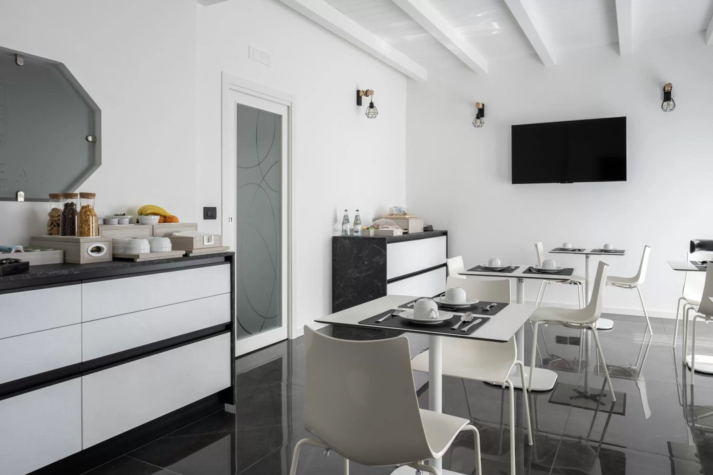 Communal lounge/ TV room in Domea Superior Rooms Bed and Breakfast