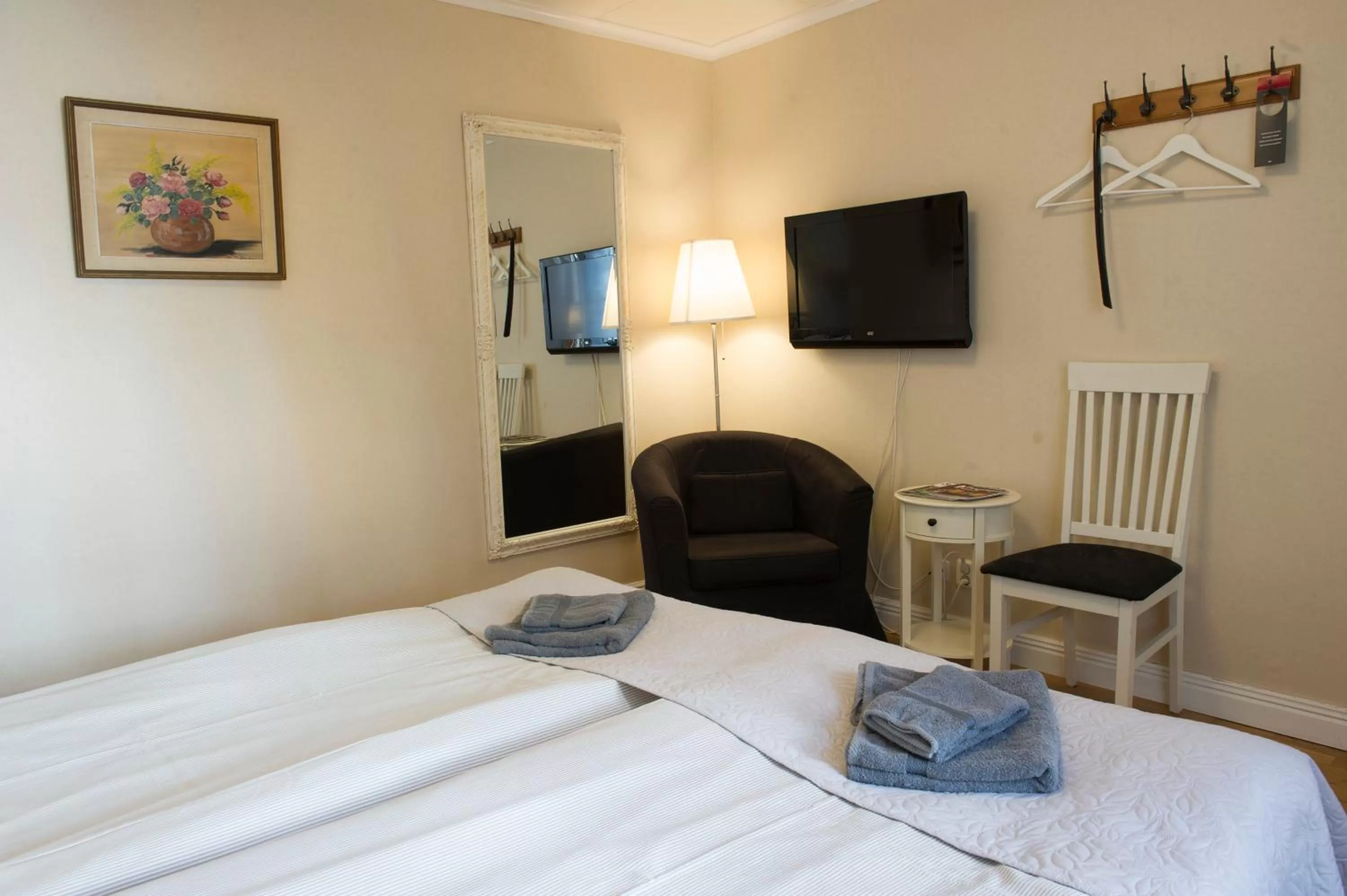 Seating area, Bed in Lilla Hotellet i Nora