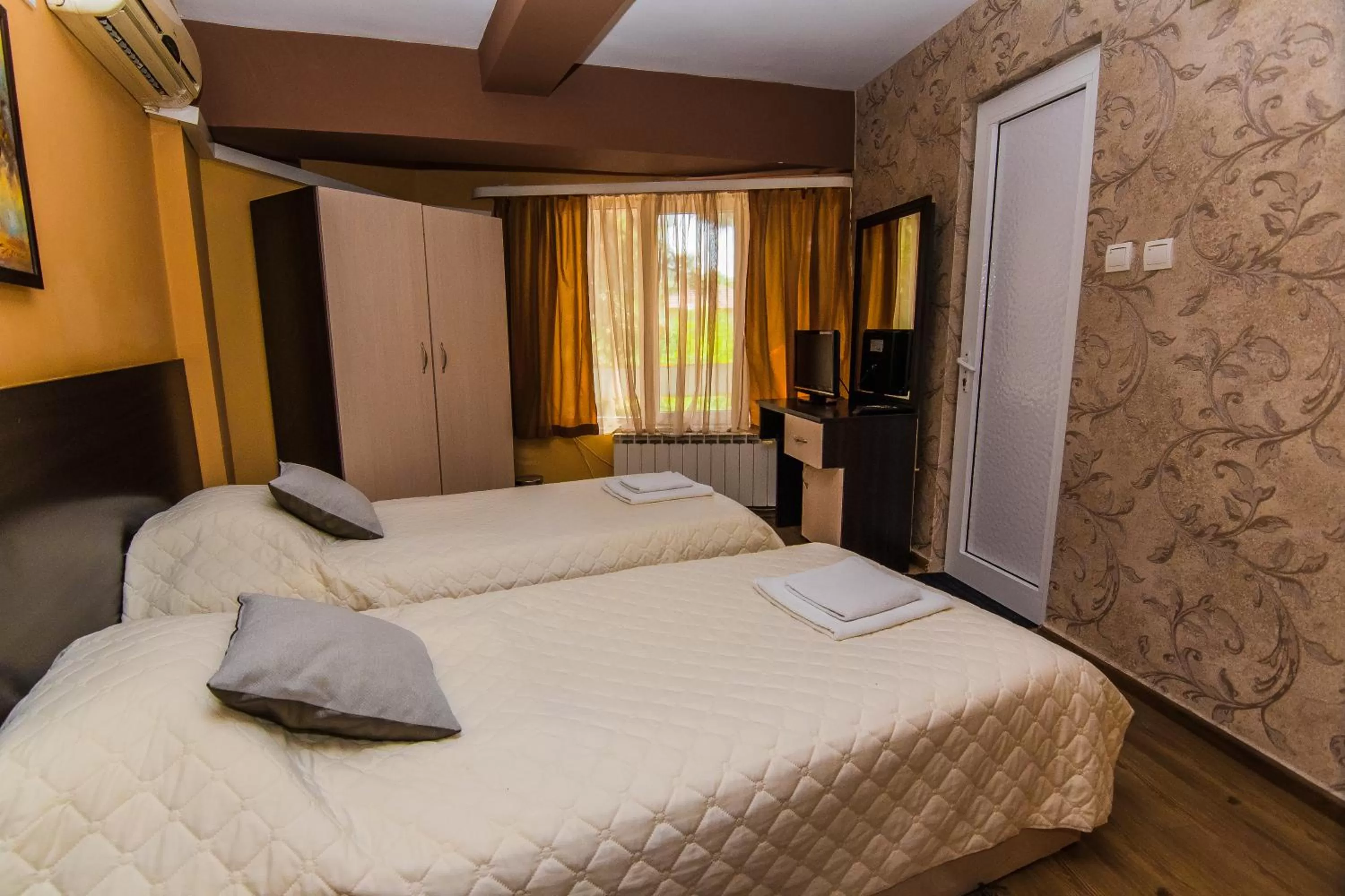 Bed in Vida Family Hotel