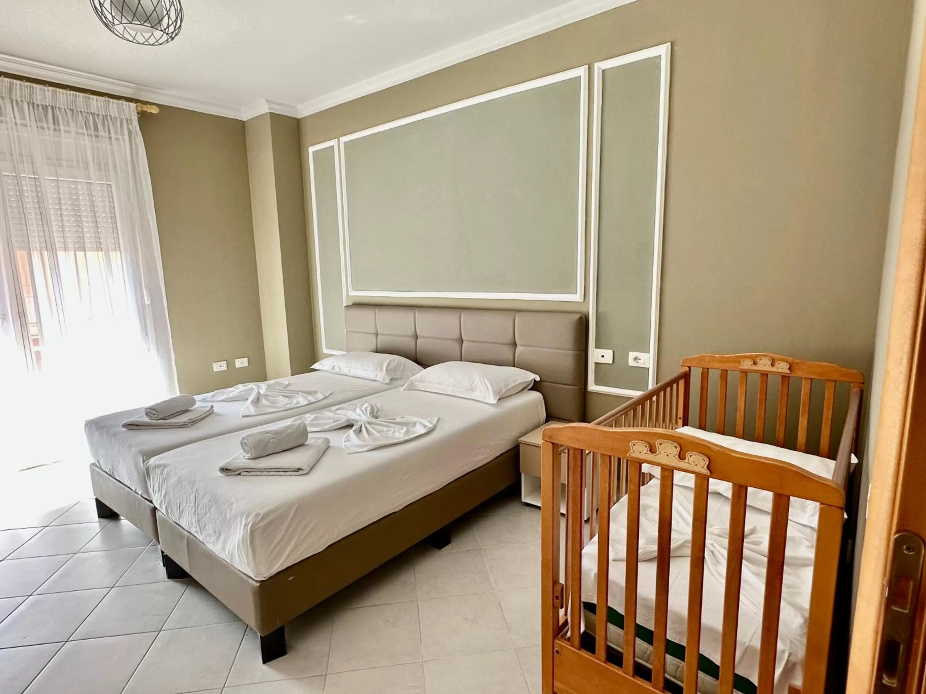 Bed in FAMILY SUITE RESIDENCE