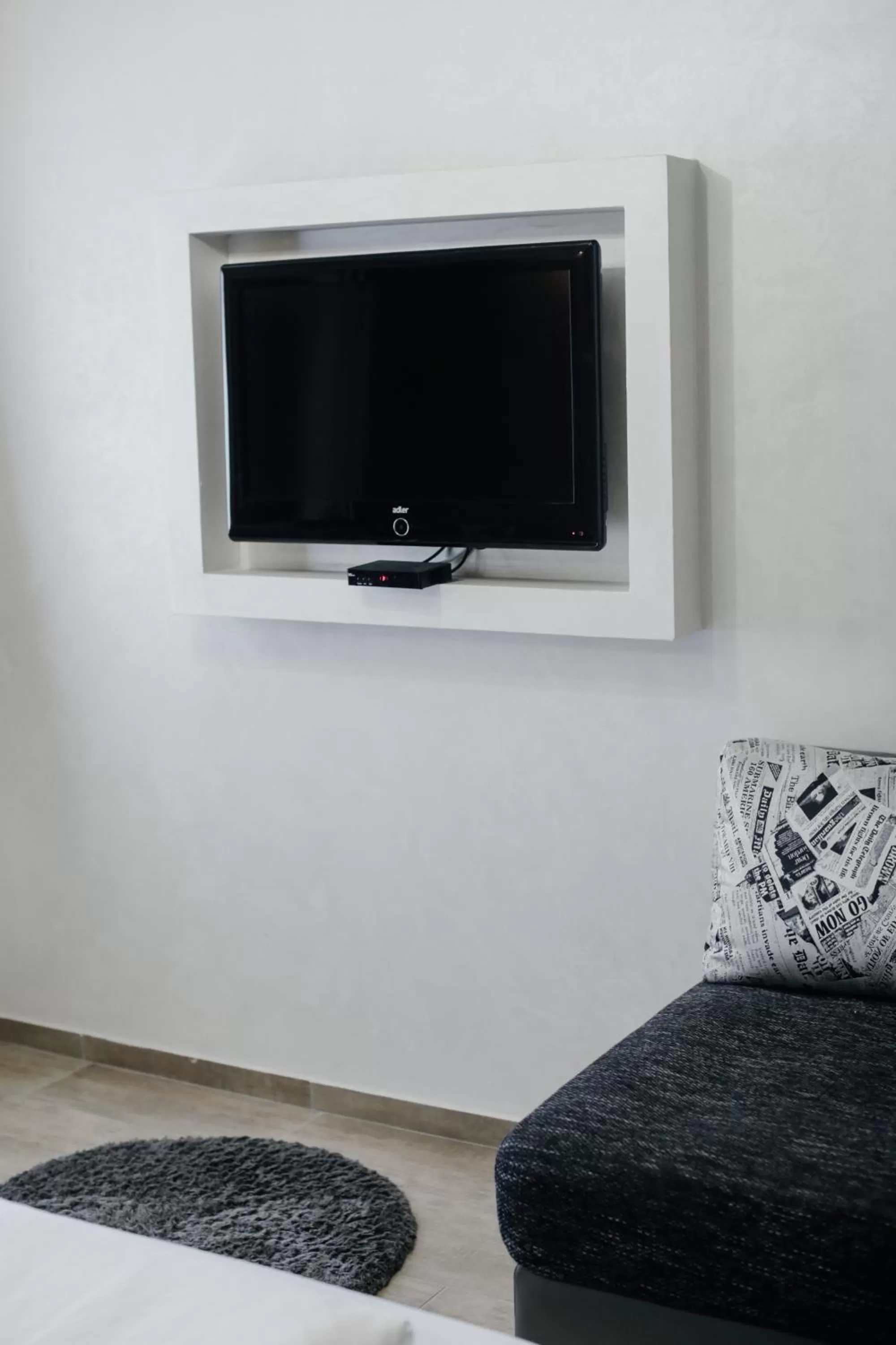 TV and multimedia, TV/Entertainment Center in Hotel Fontana