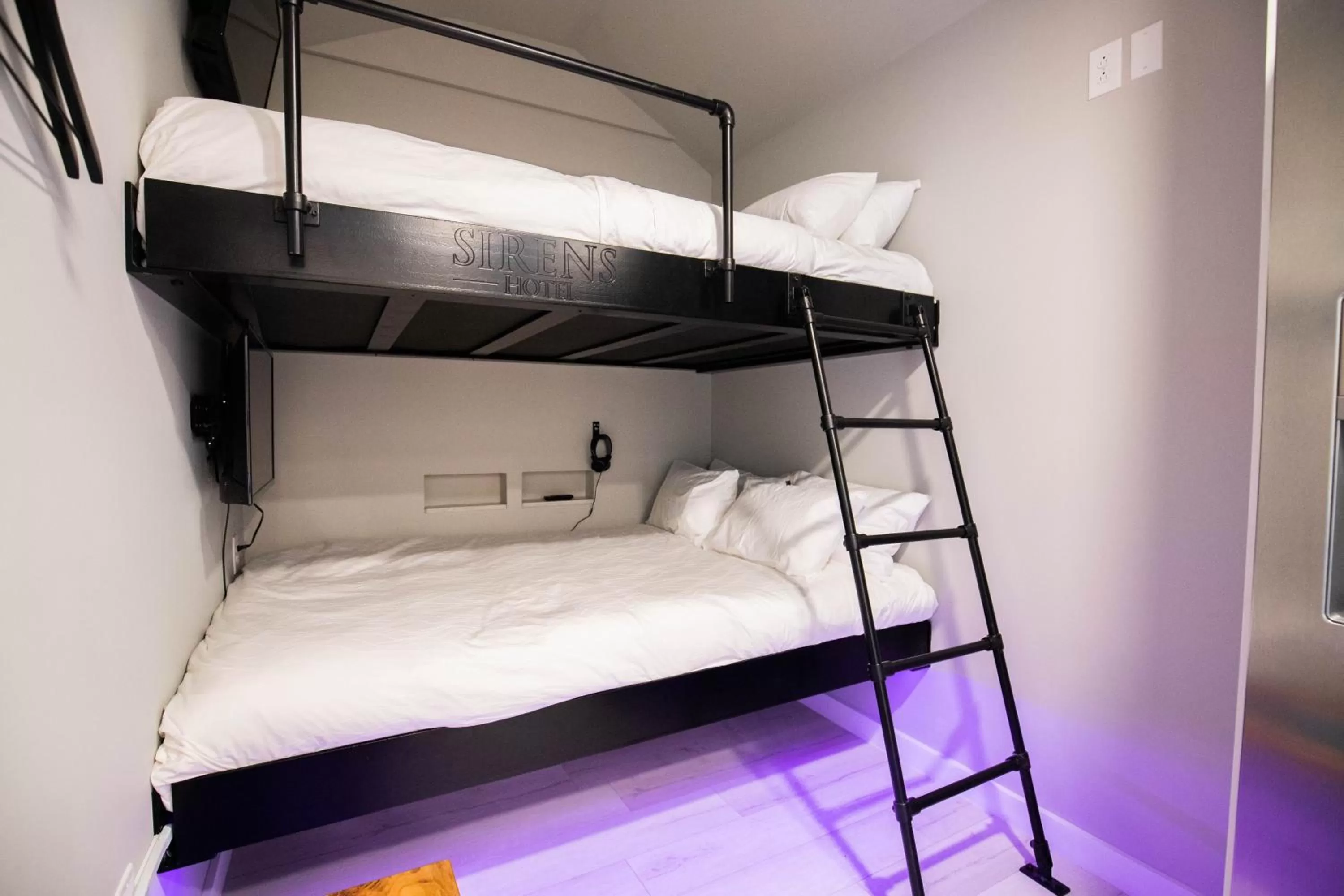 Bed in River Sirens Hotel-Contactless Check in Hotel