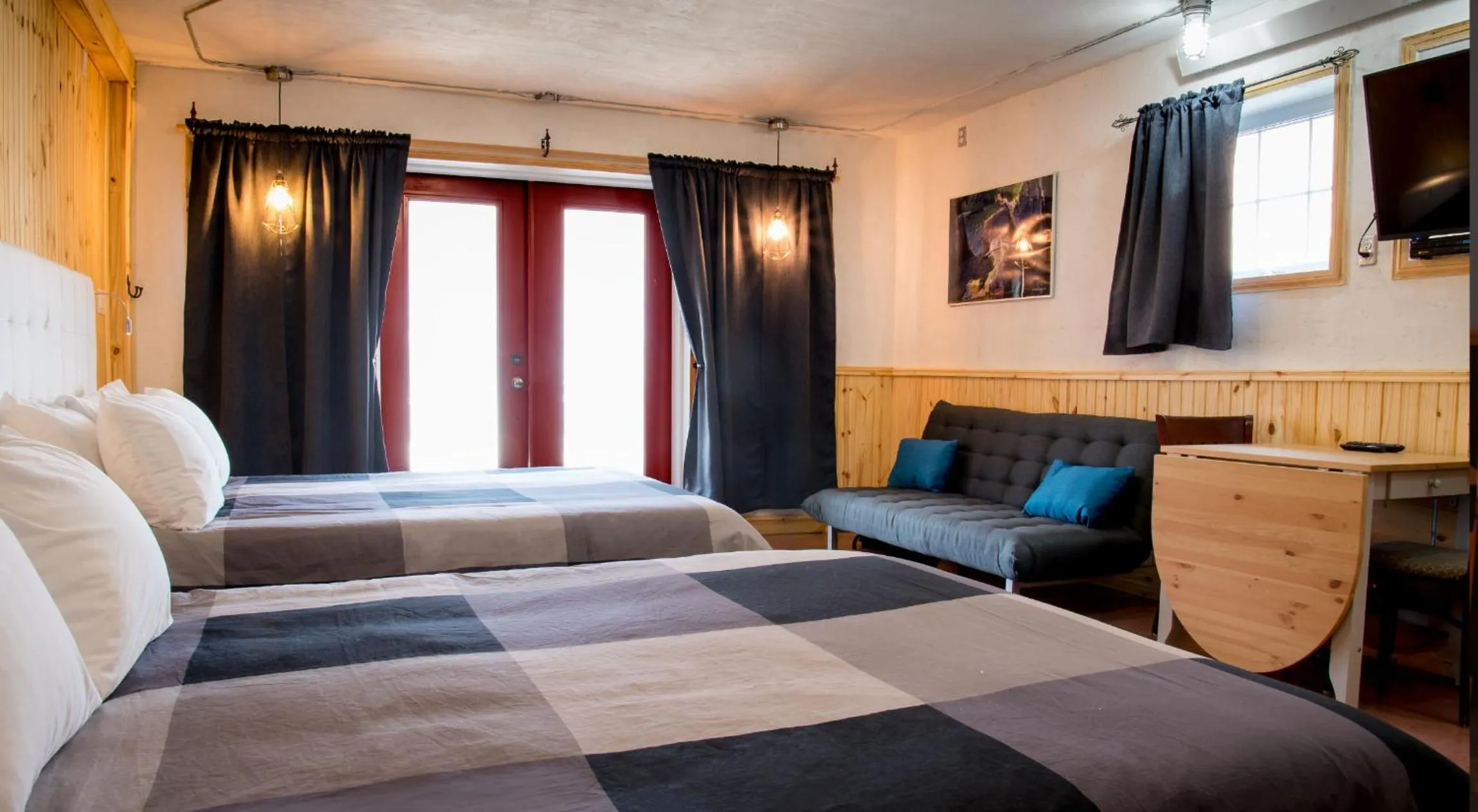 Bed in La Galouine Auberge