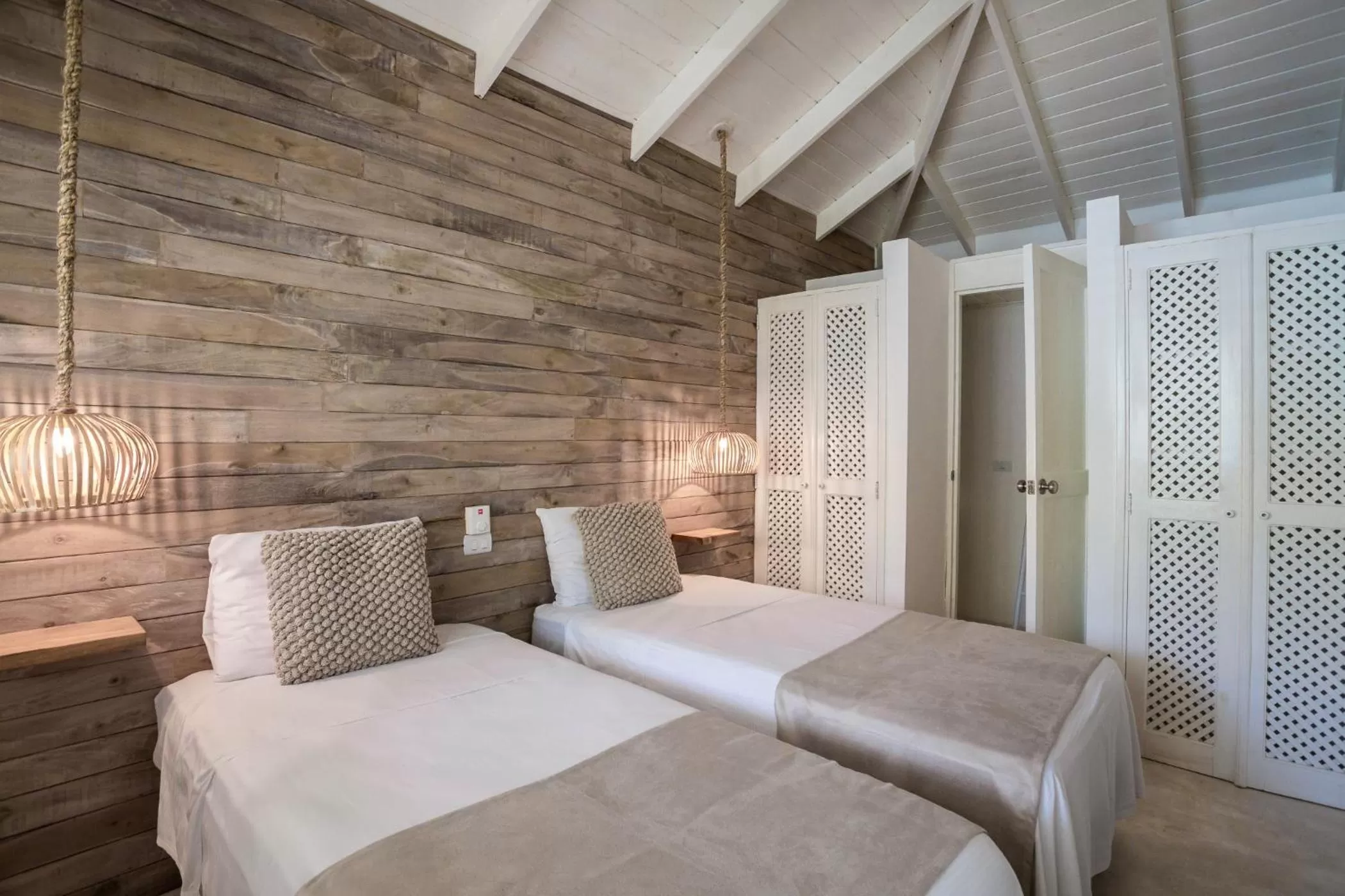 Bed in Mahona Boutique Hotel