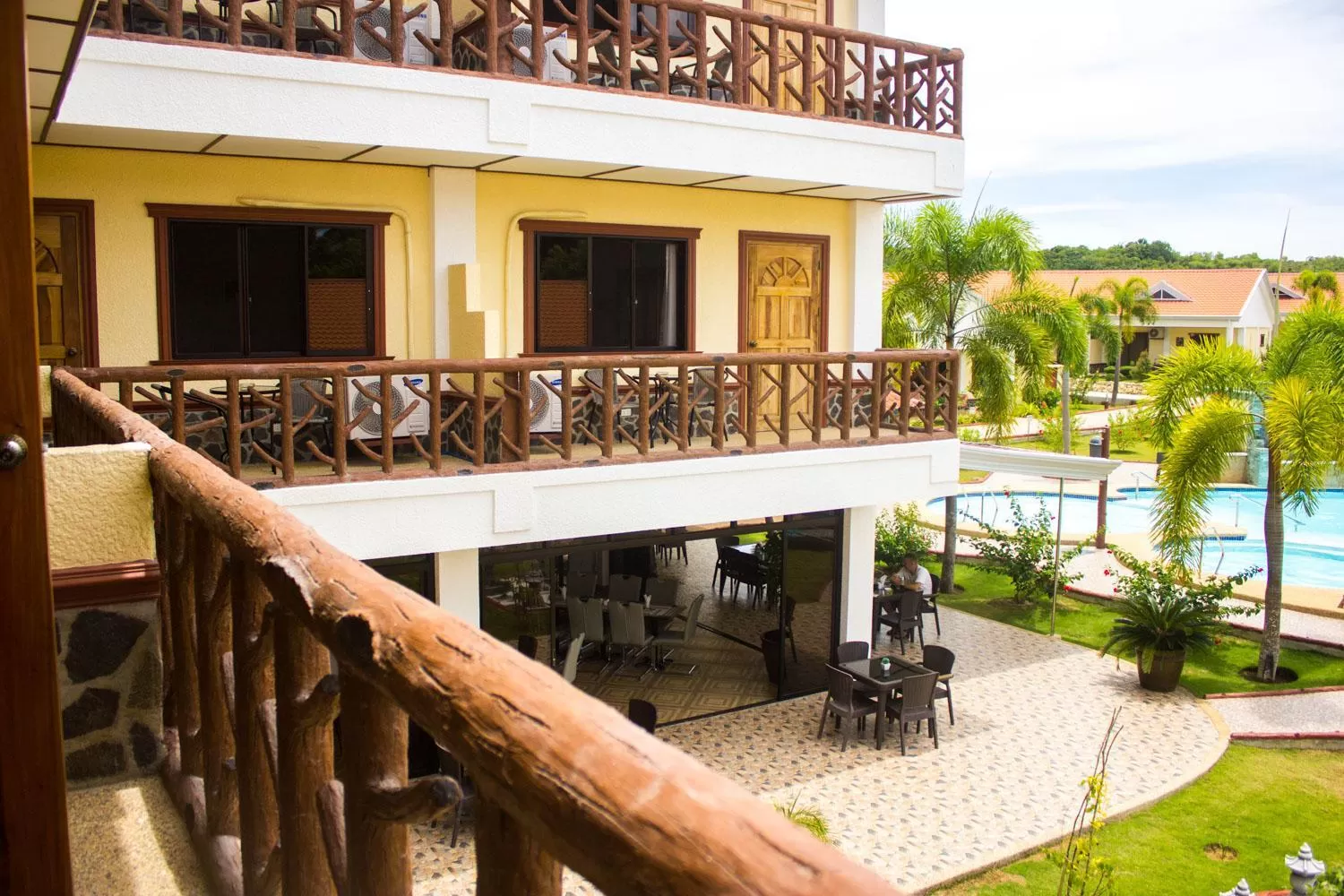 Balcony/Terrace, Pool View in Jugalis Hotel and Restaurant