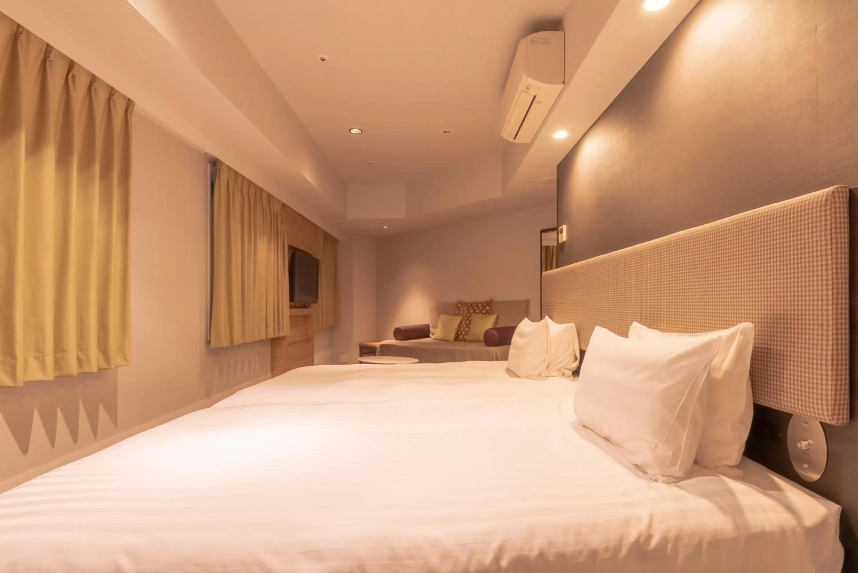 Bed in E Hotel Higashi Shinjuku