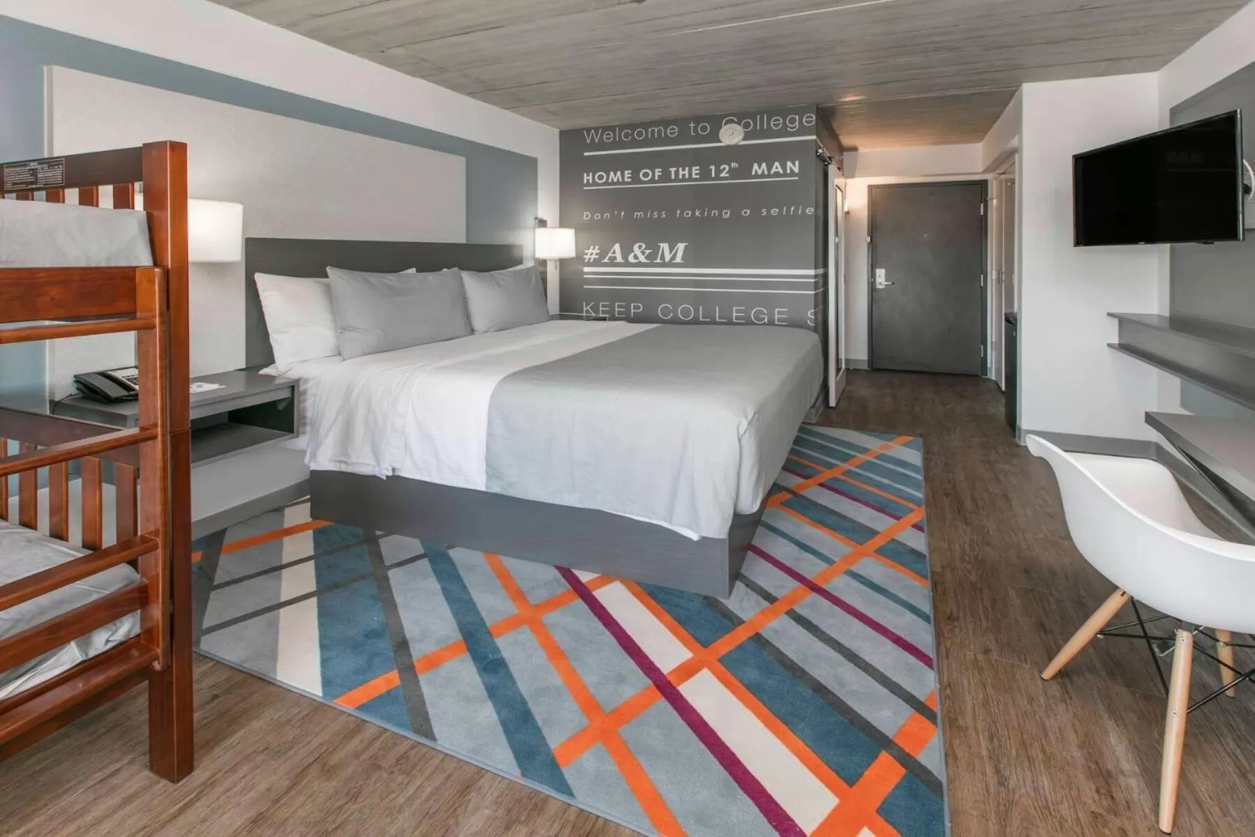 Photo of the whole room, Bed in voco College Station Aggieland by IHG