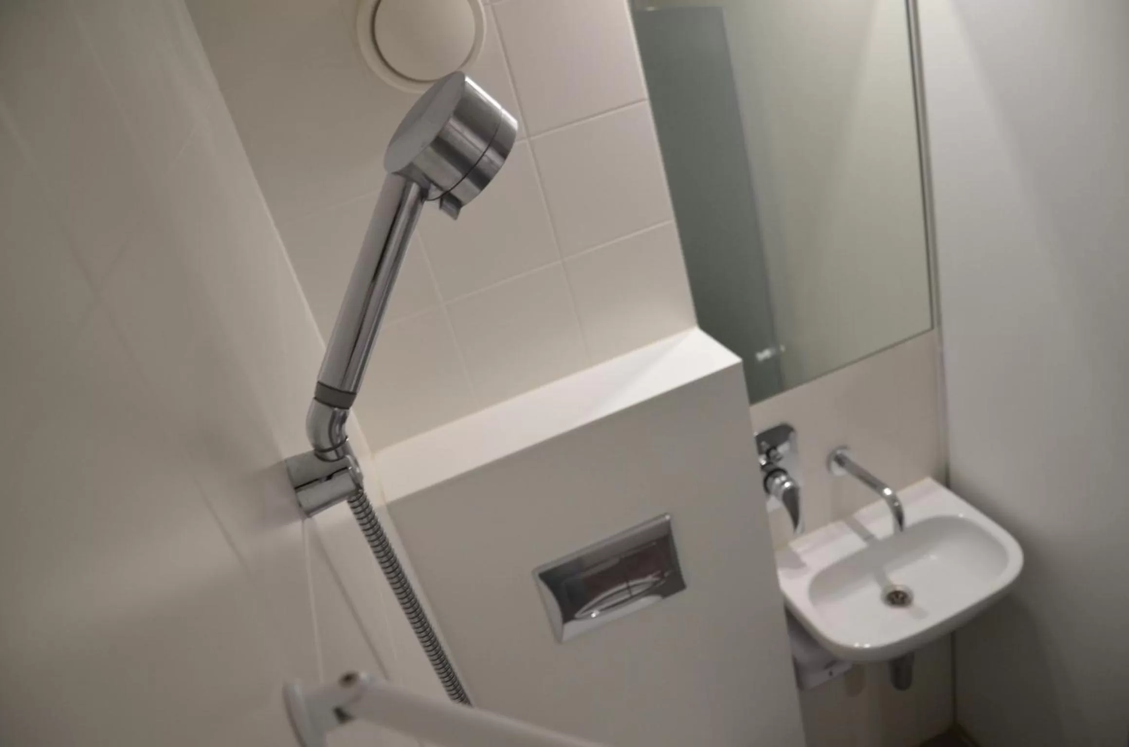 Shower in Eklo Hotels Le Mans