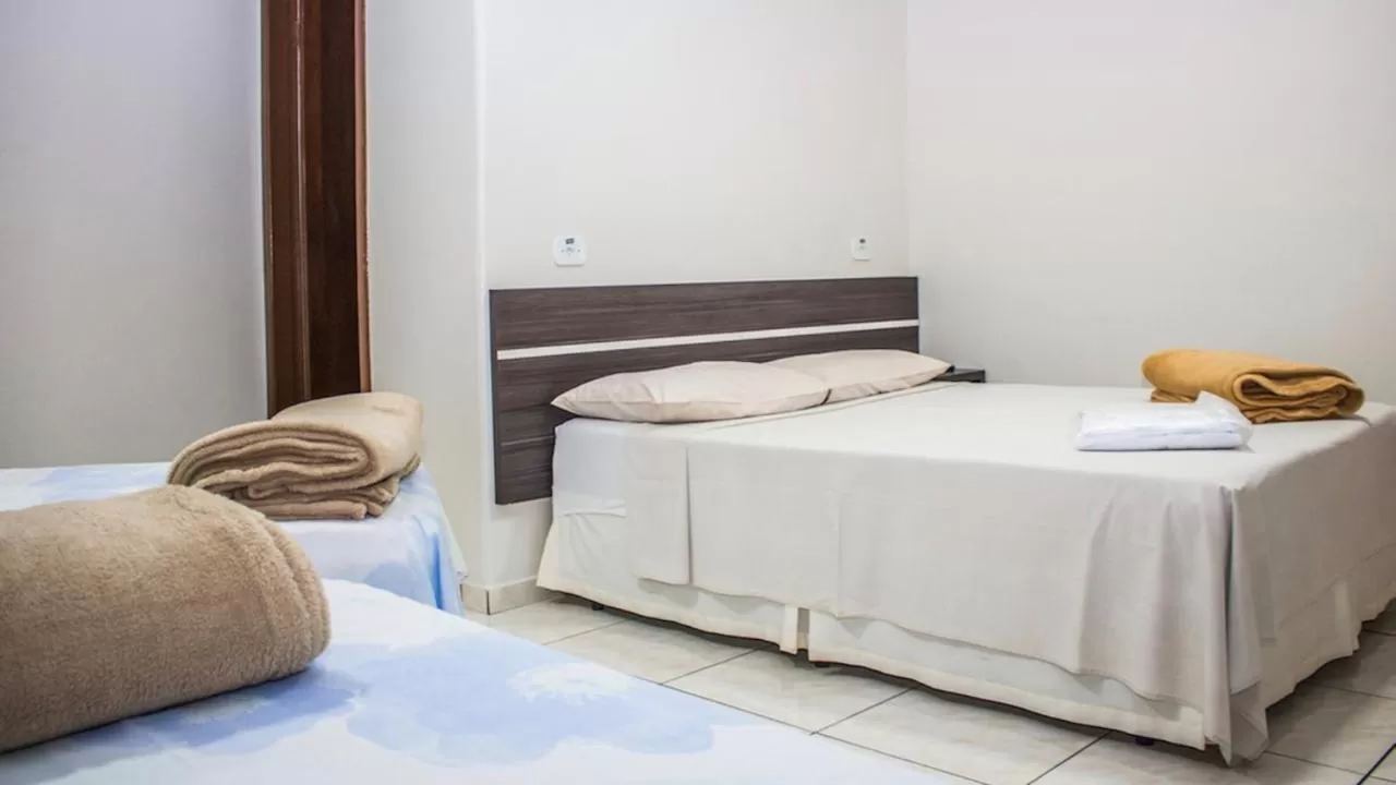 Bed in Hotel Paradizzo