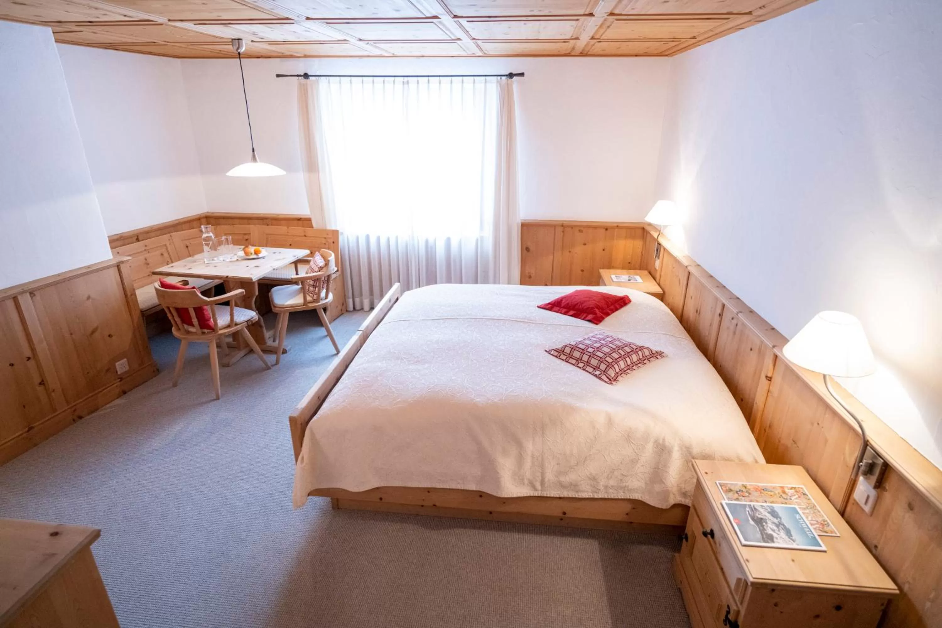 Bed in Hotel Engiadina