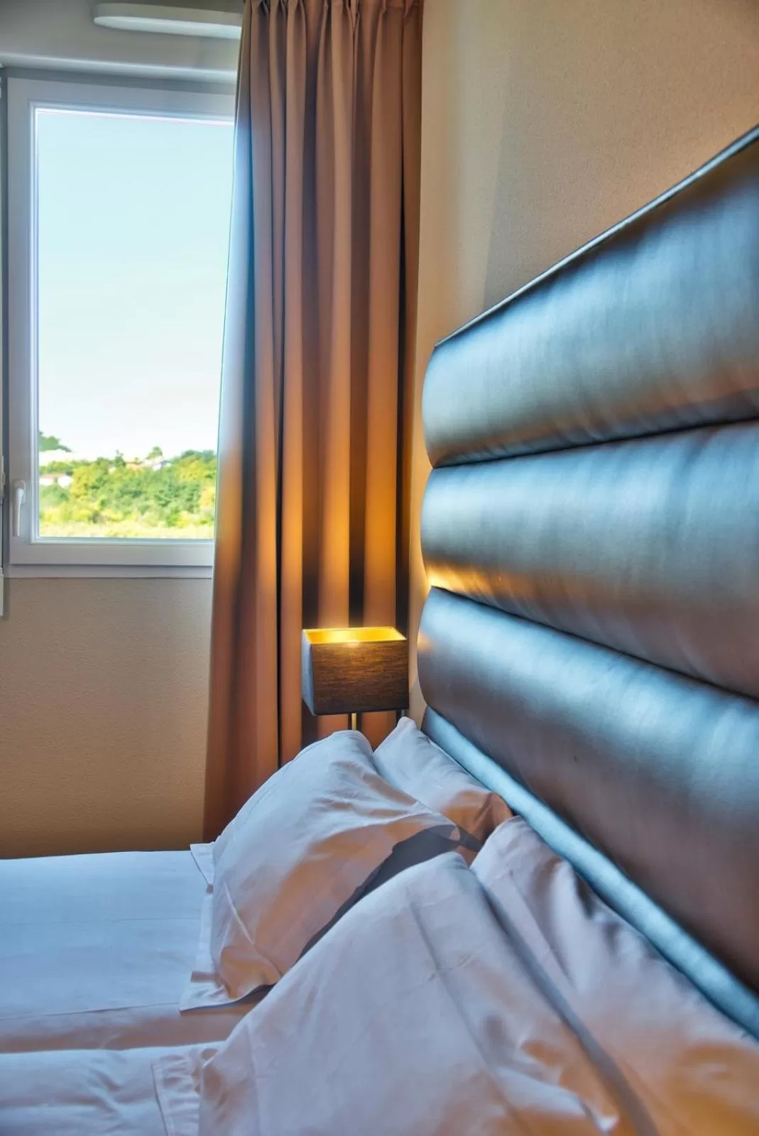 Bed in Adonis Hotel Bayonne