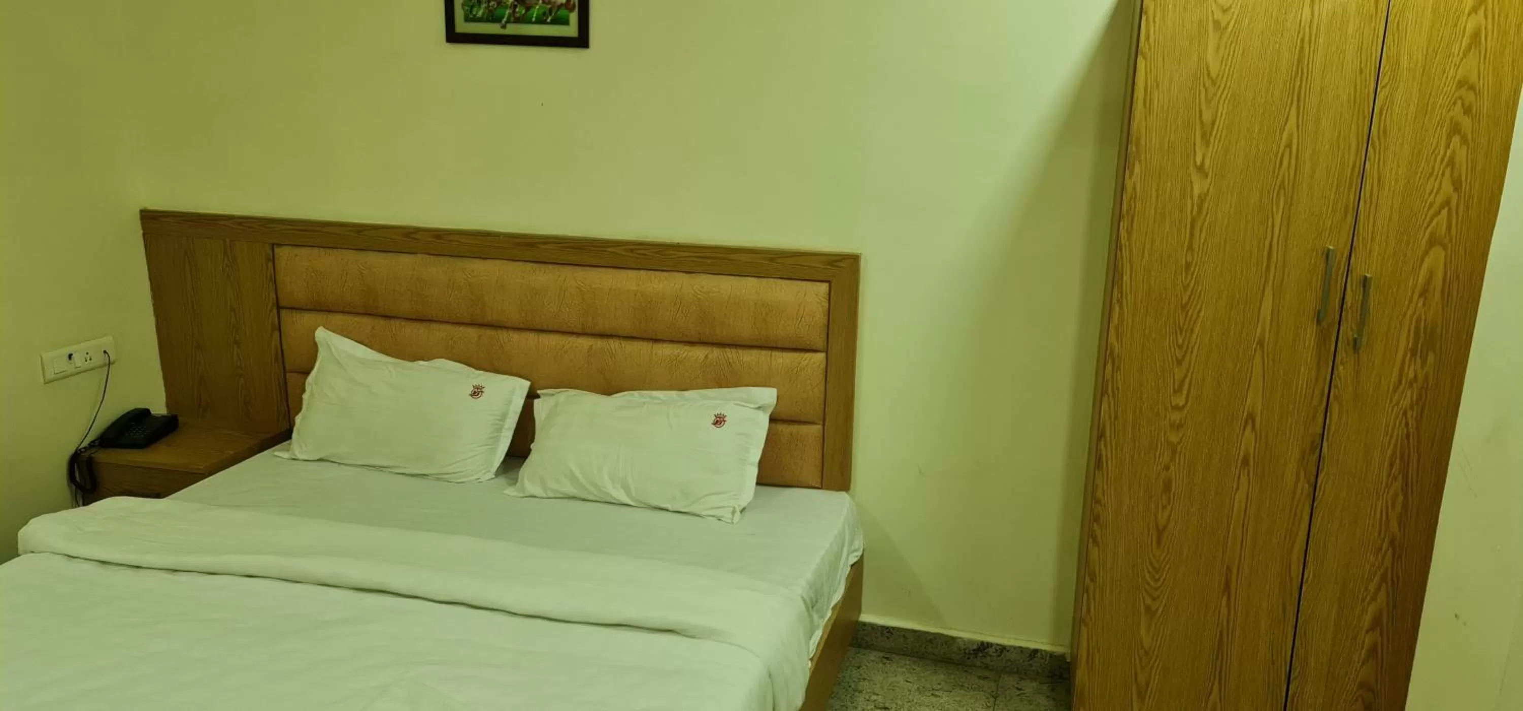 Bed in Vijay Shree Inn