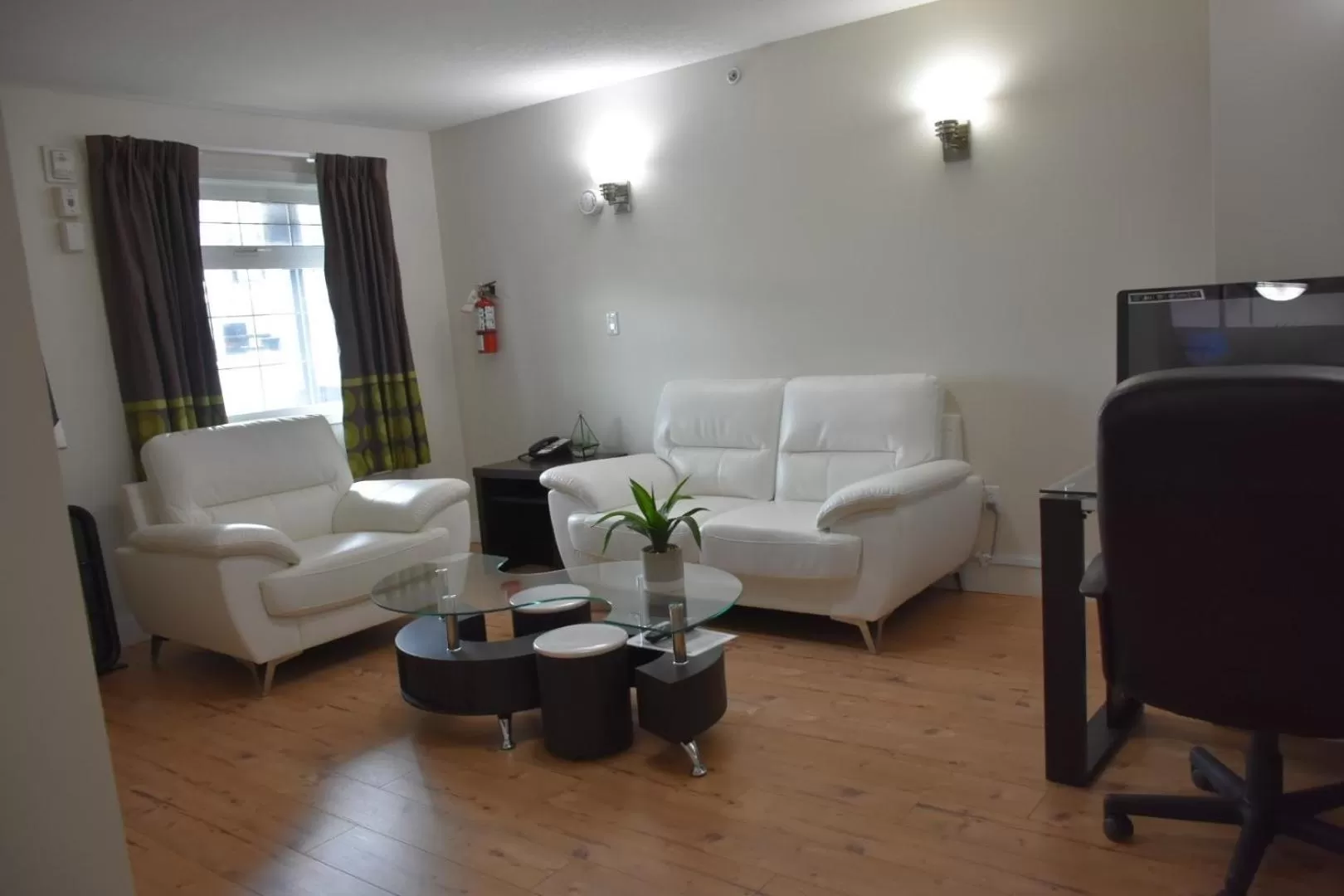 Seating area in Super 8 by Wyndham Fort McMurray