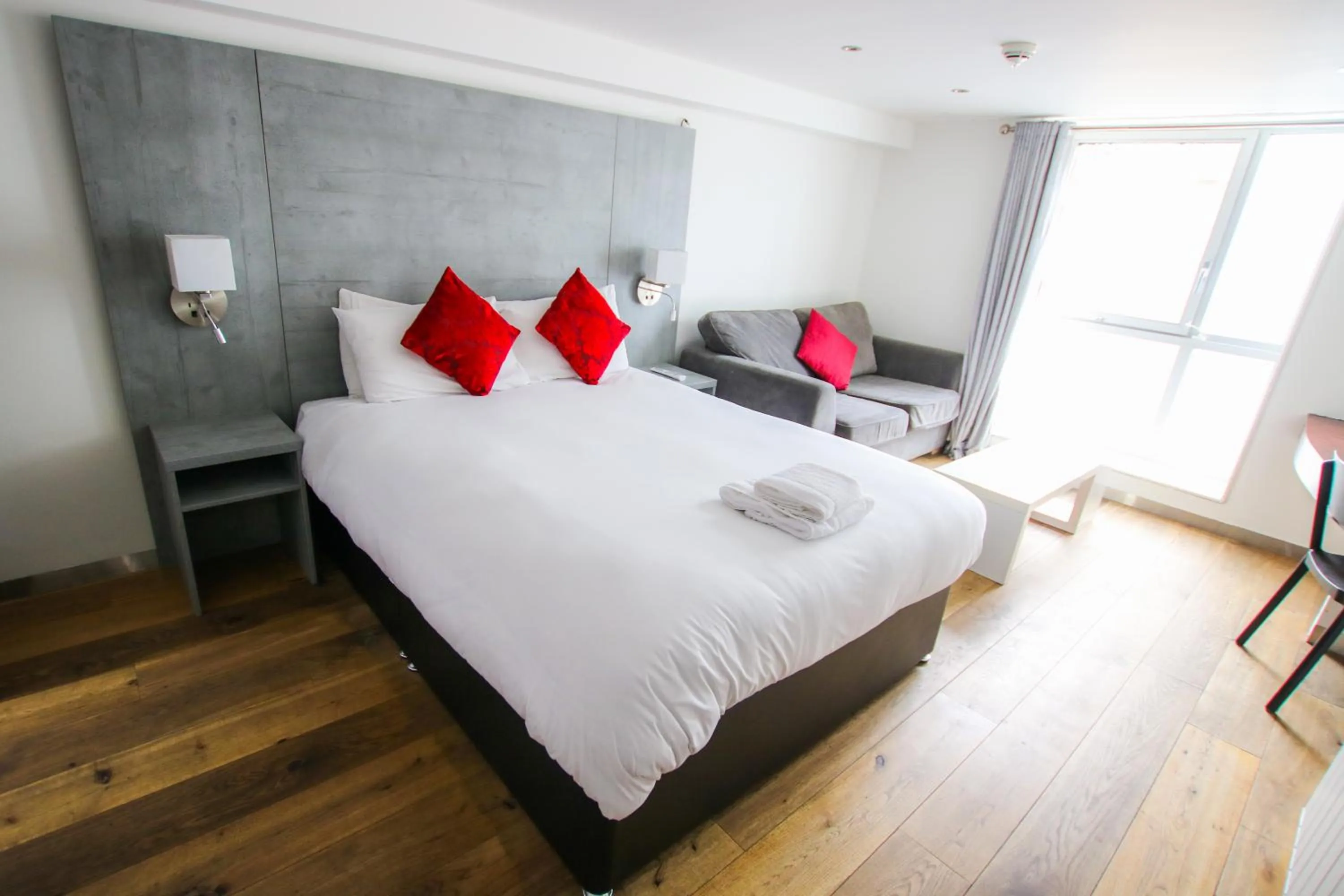 Seating area, Bed in Brunswick Merchant City Hotel