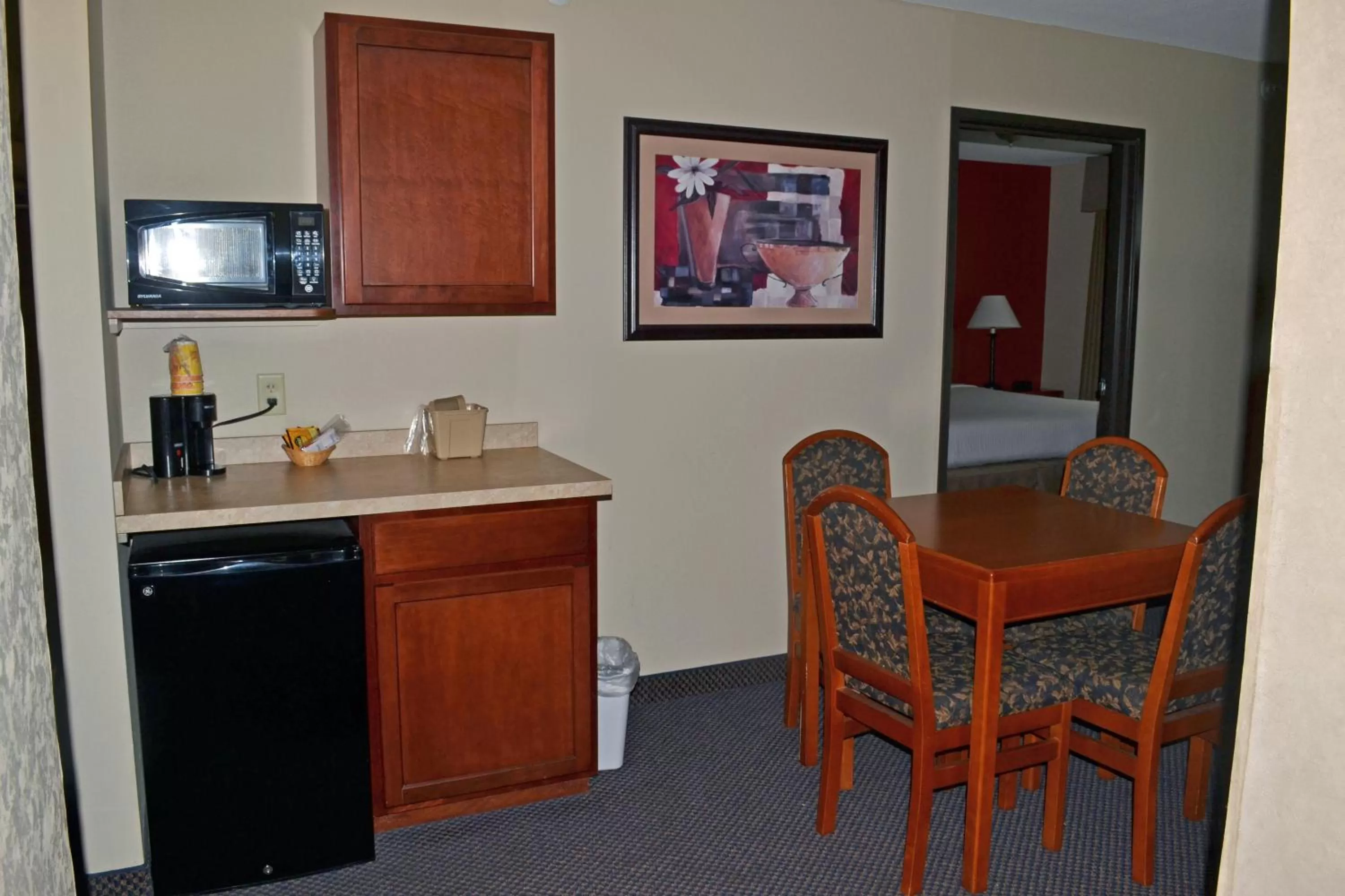 Kitchen or kitchenette in Paola Inn and Suites