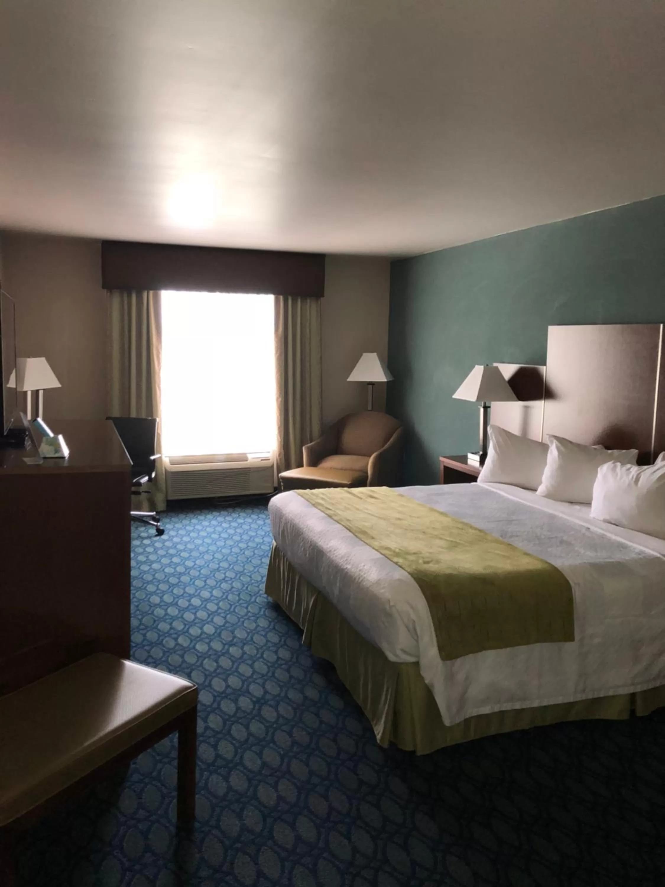 Bed in Countryview Inn & Suites