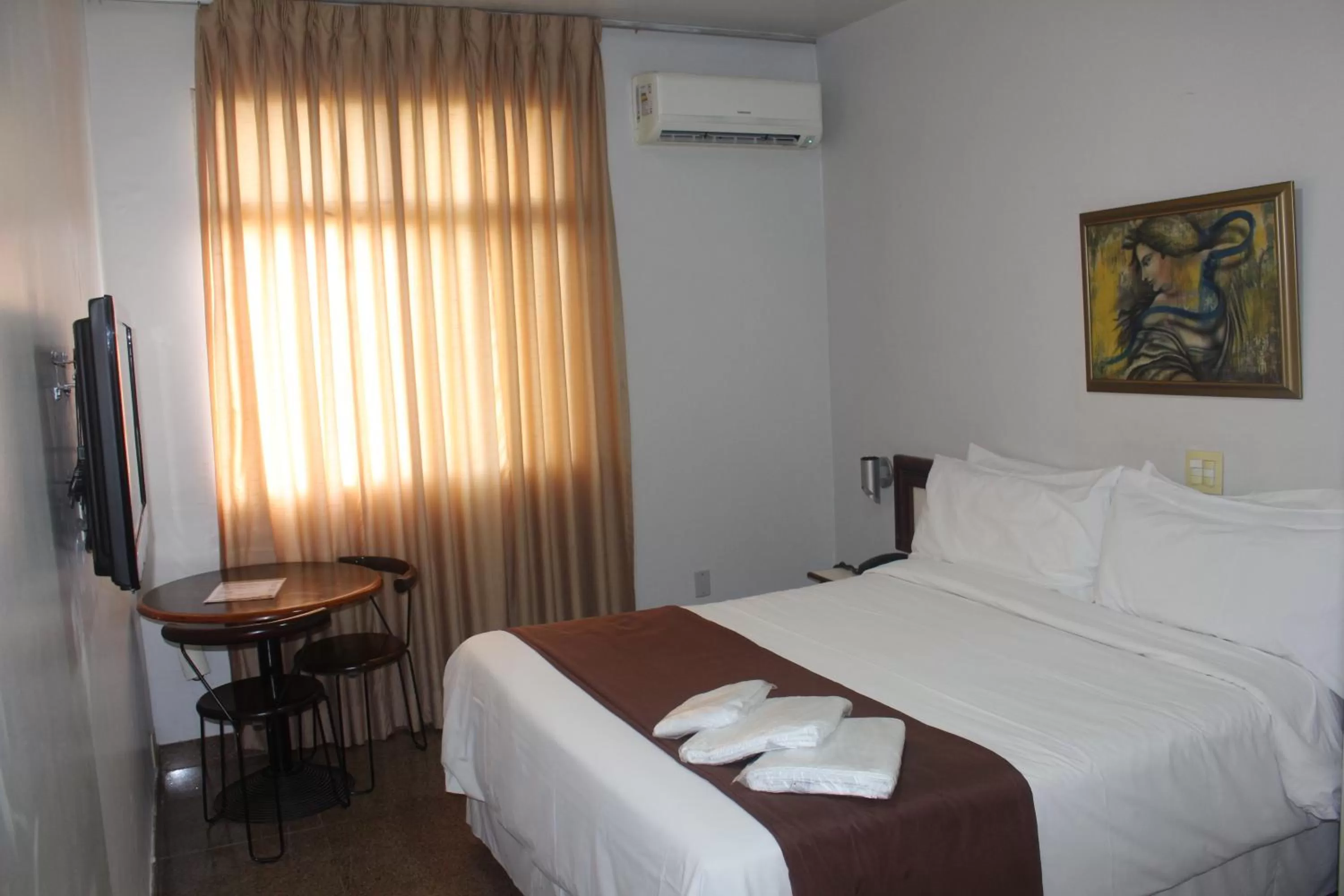 Bed in Hotel Oscar Econômico