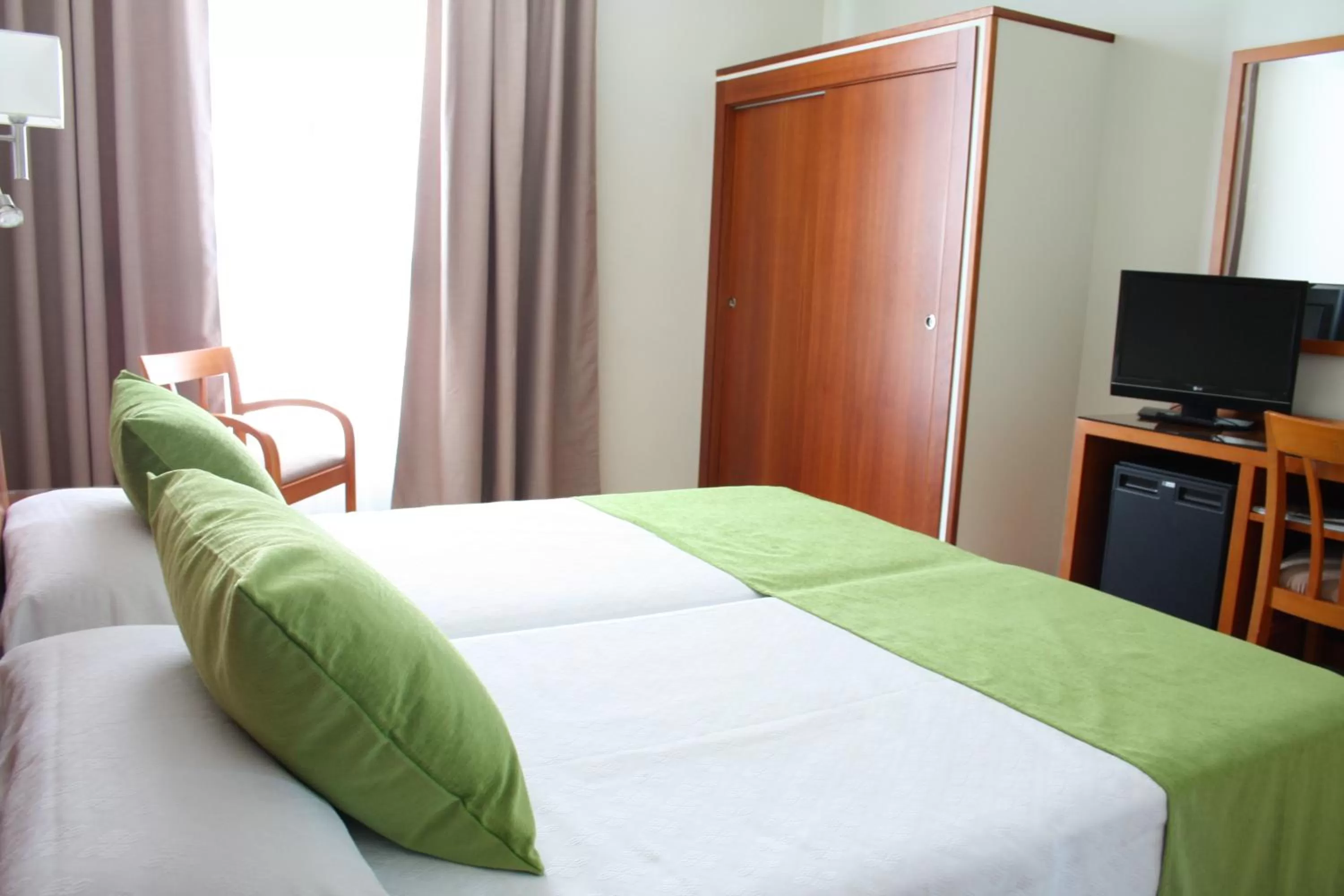 Photo of the whole room, Bed in Hotel Pujol