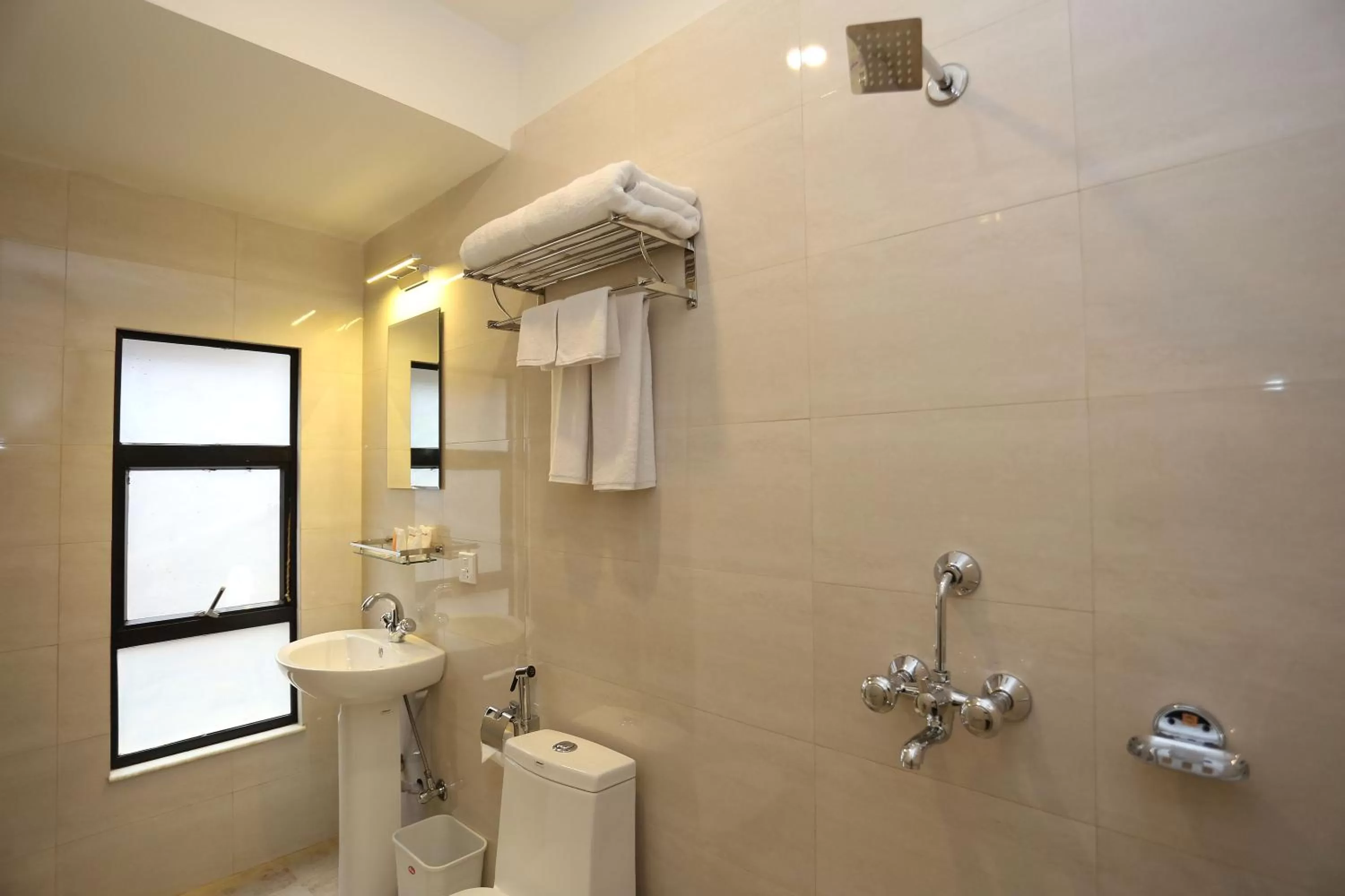 Bathroom in Hotel Jay Suites
