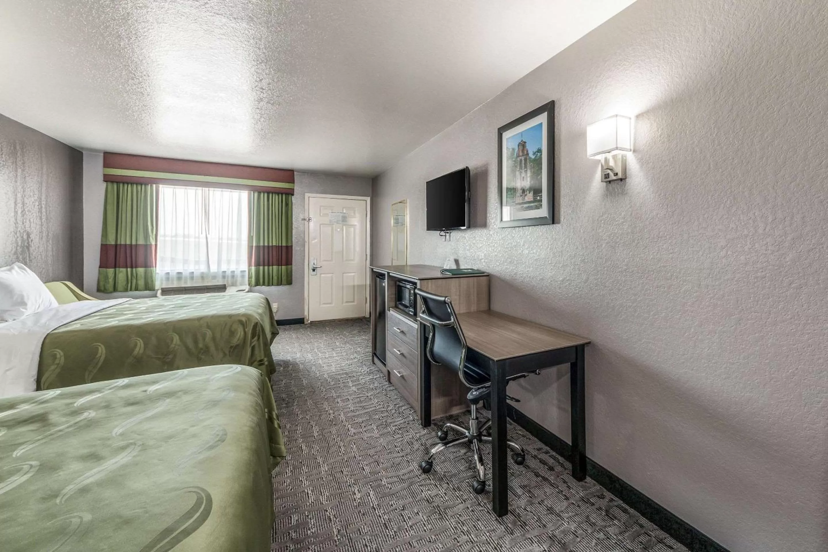 Photo of the whole room, Bed in Quality Inn I-10 East near Frost Bank Center