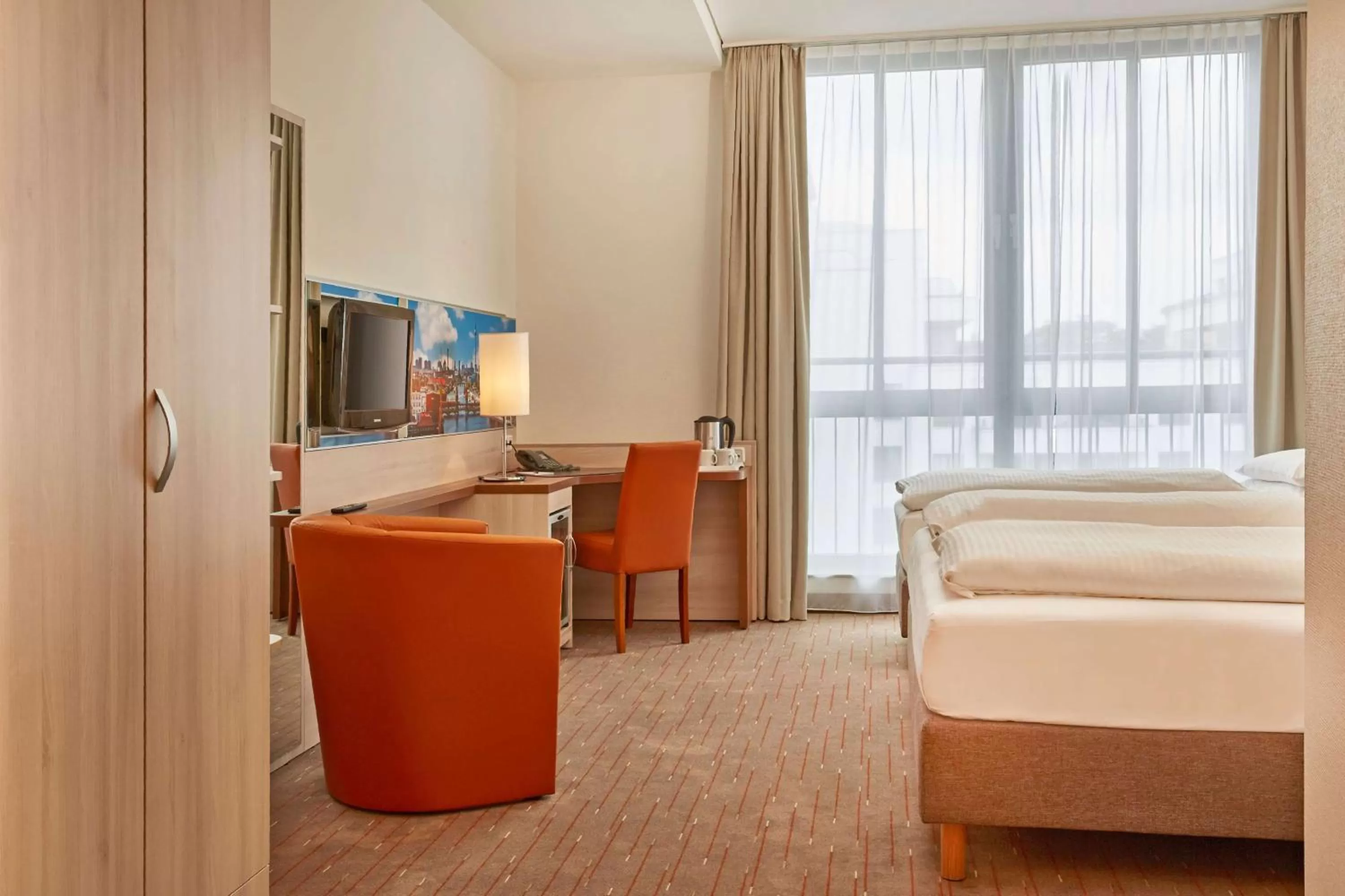 Photo of the whole room, Bed in H+ Hotel Berlin Mitte