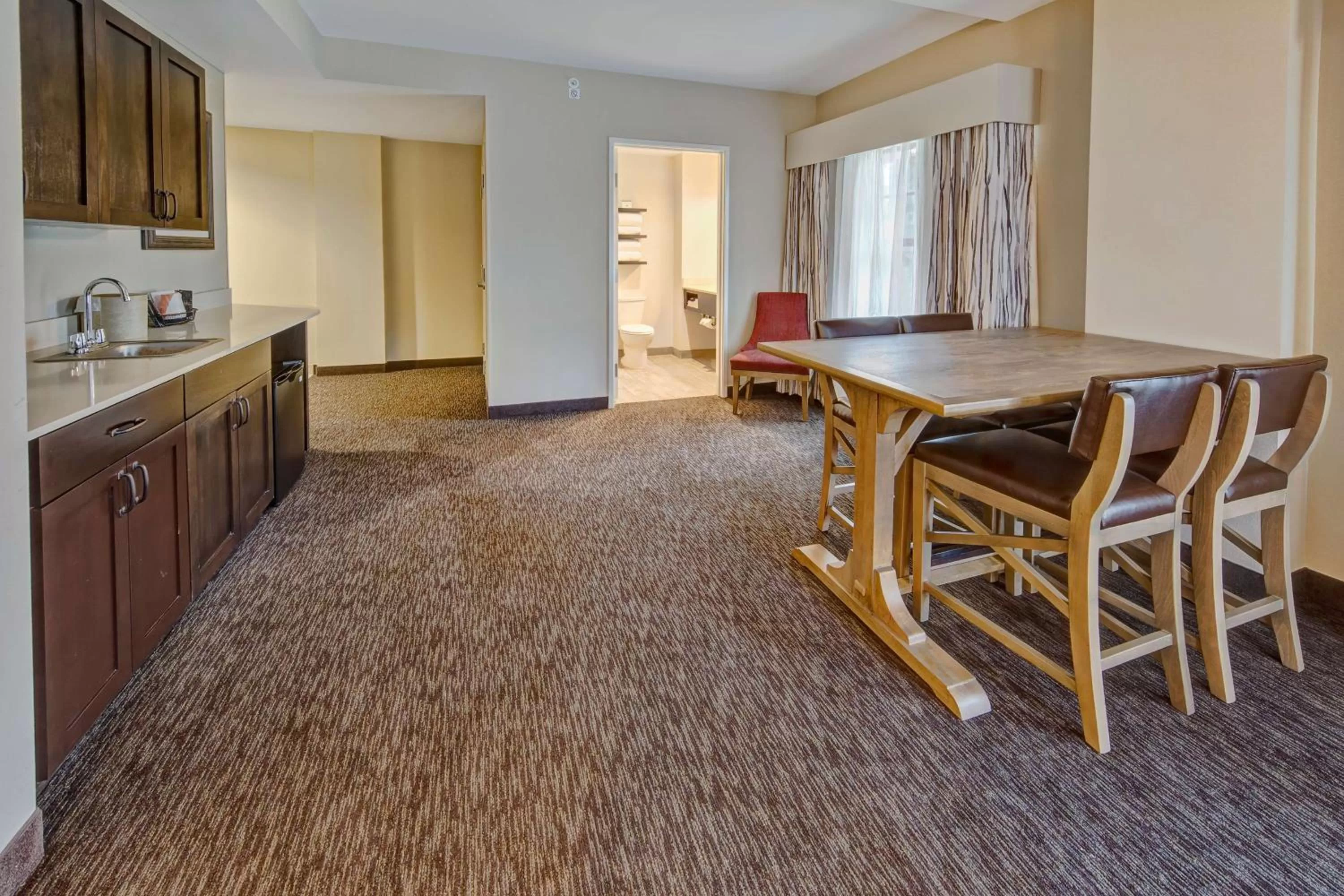 Corner Suite with Two Queen Beds, Balcony and River/Mountain View in Black Fox Lodge Pigeon Forge, Tapestry Collection by Hilton