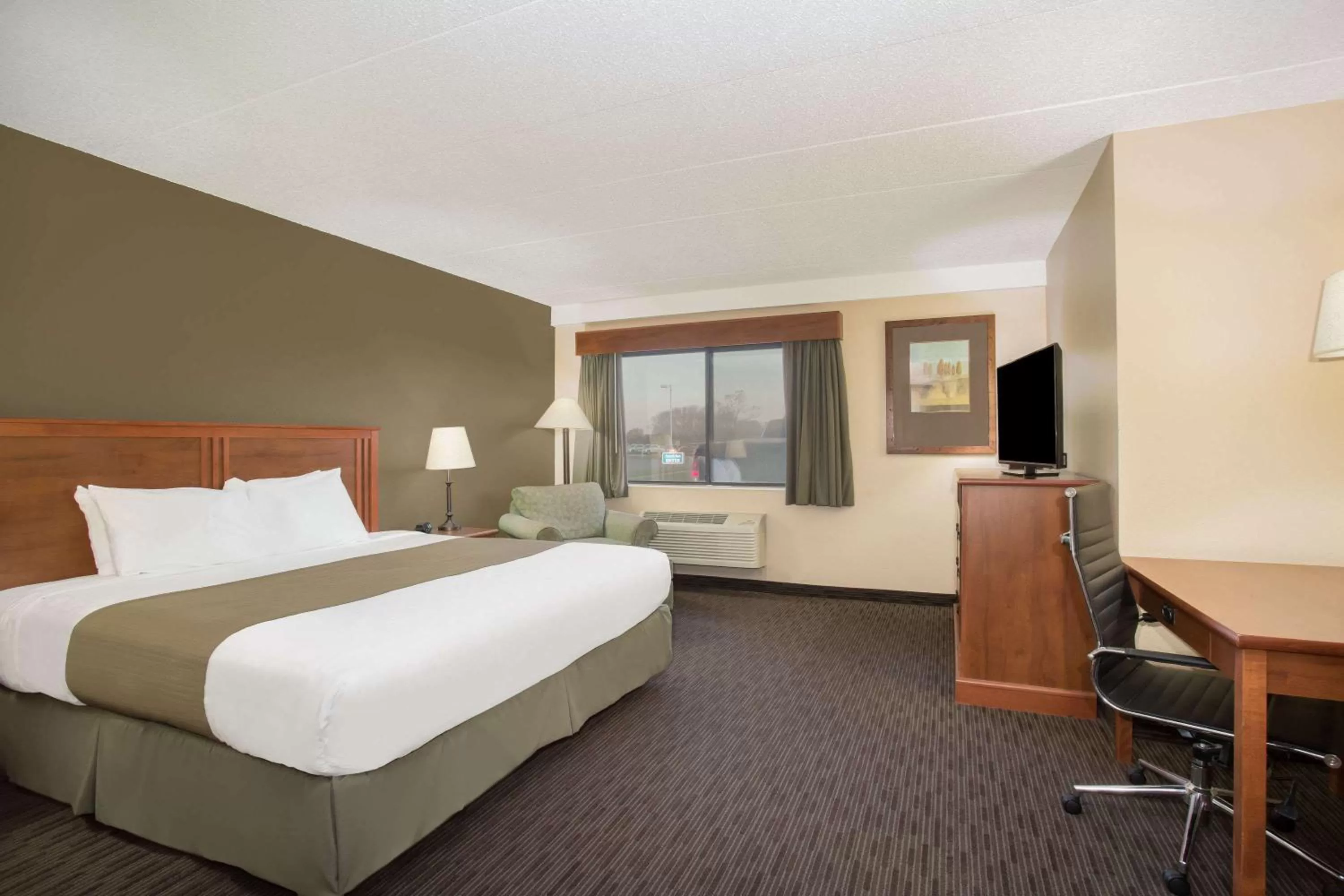 Photo of the whole room, Bed in AmericInn by Wyndham Sioux City