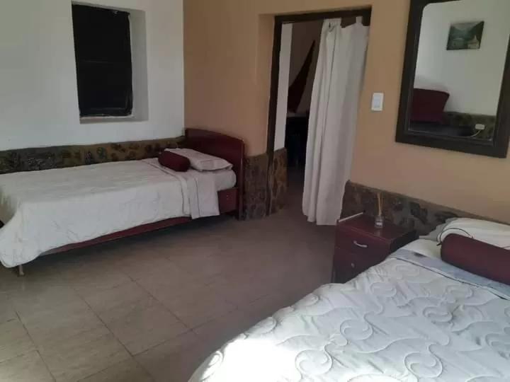 Bed in Hotel Hacienda Casa Blanca