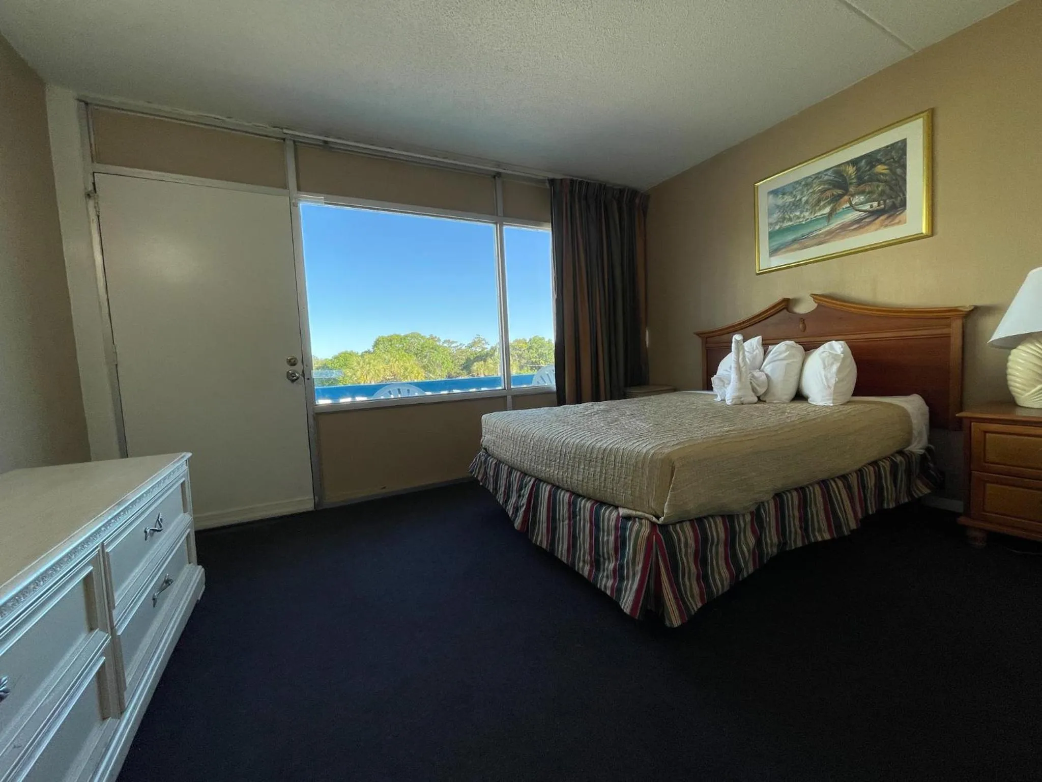 Bed in Polynesian Oceanfront Hotel