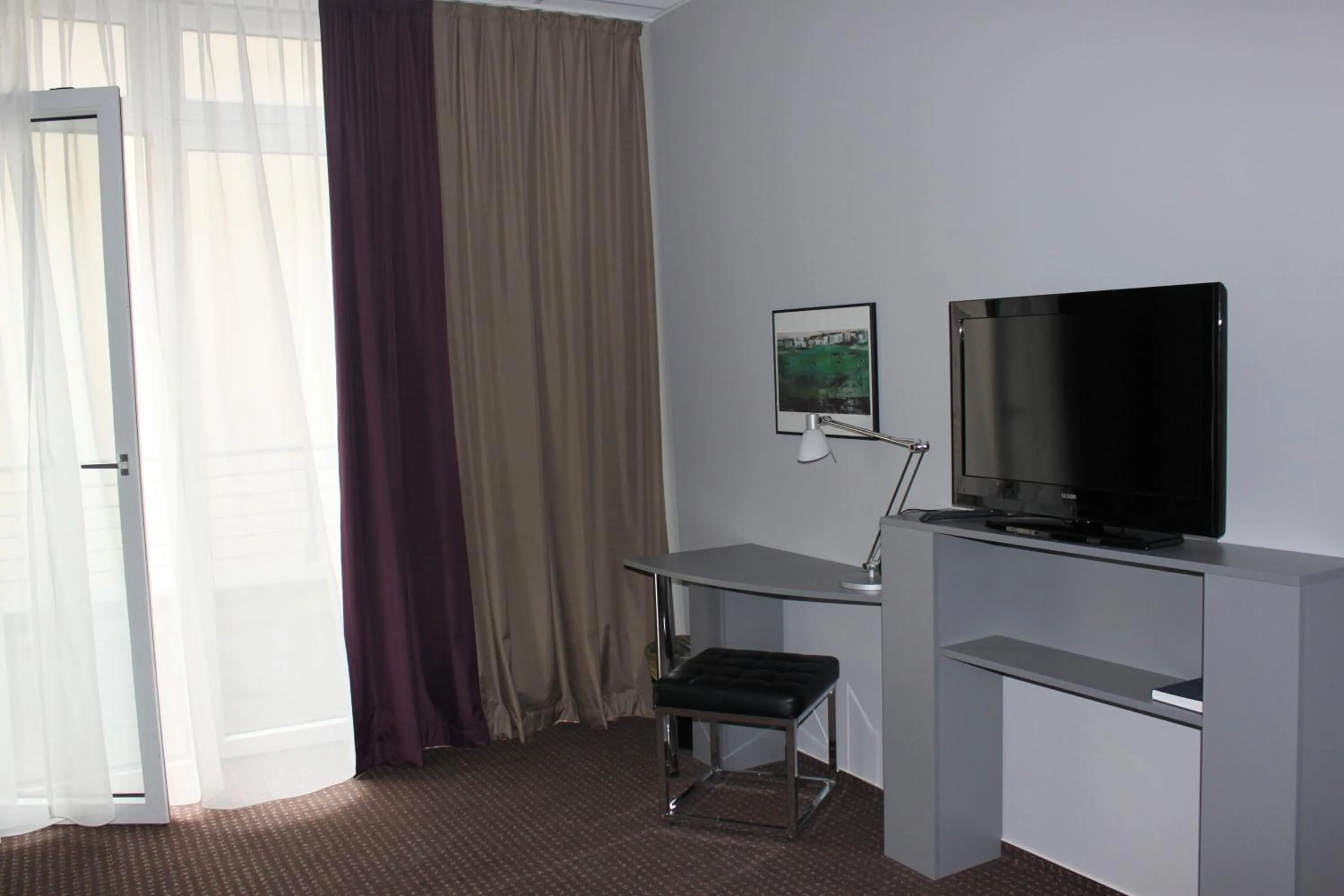 TV and multimedia in Hotel Arena Inn - Berlin Mitte