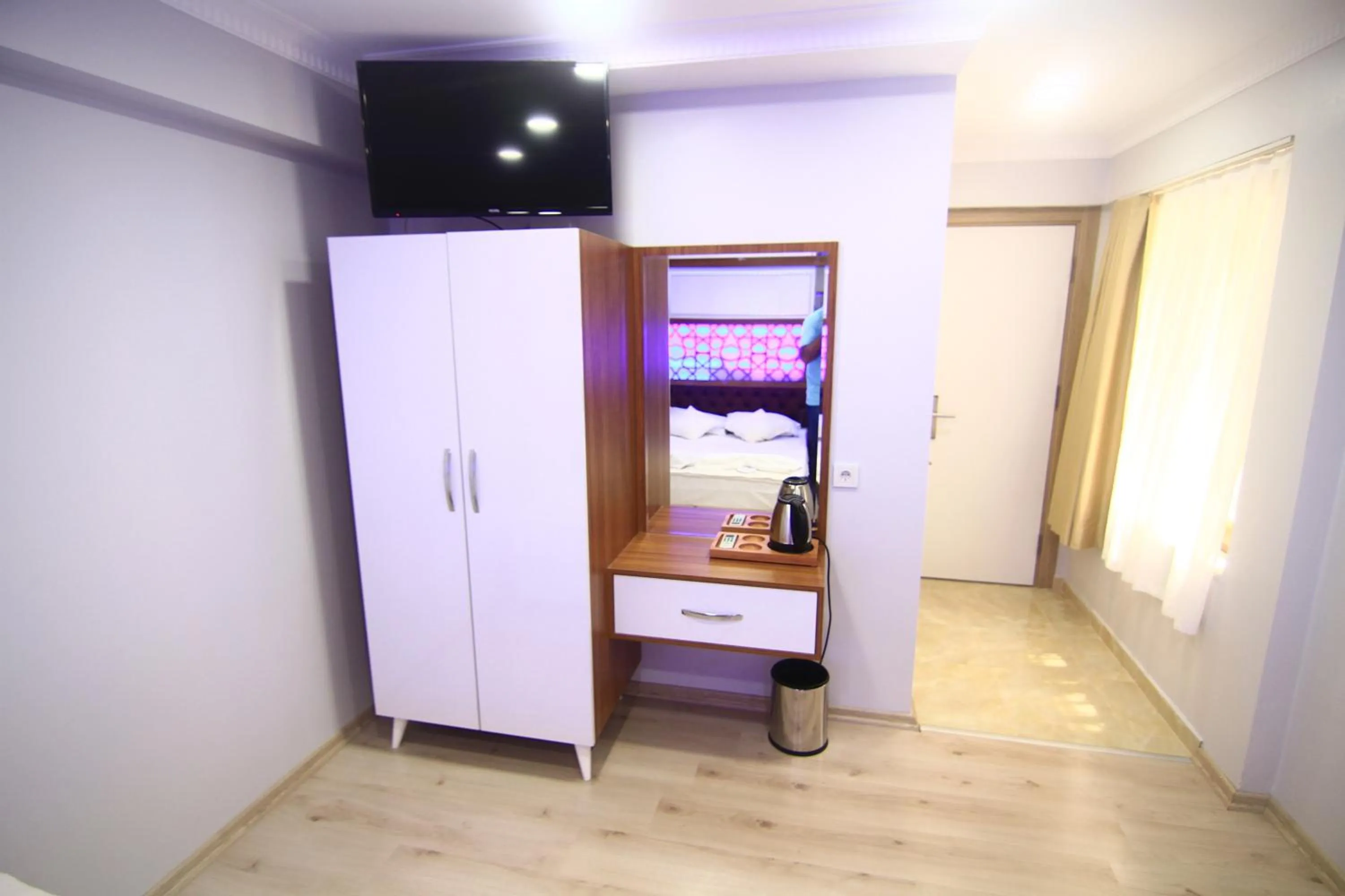 Photo of the whole room, Bed in Grand Liza Hotel