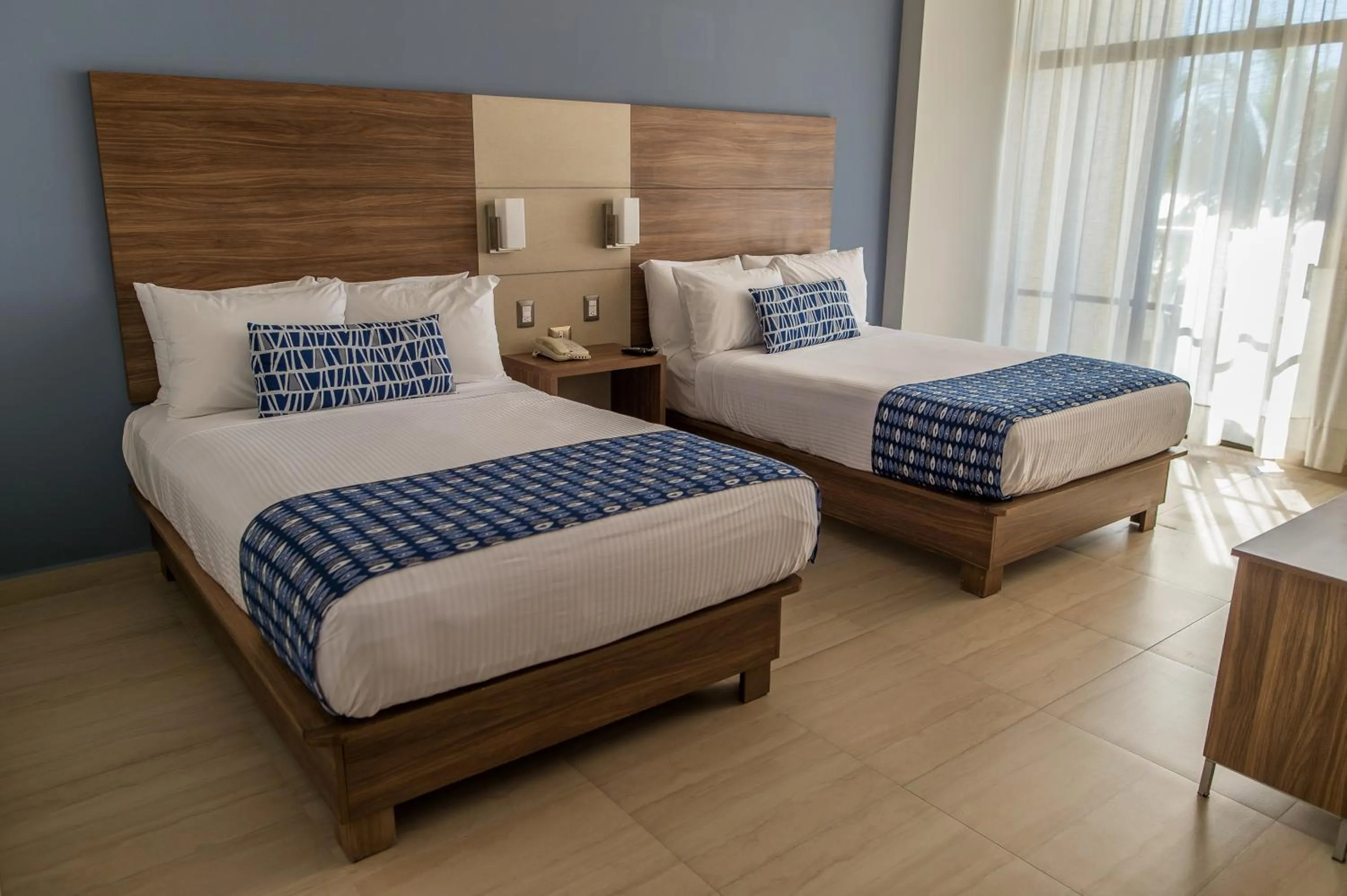 Photo of the whole room, Bed in Ocean View Beach Hotel