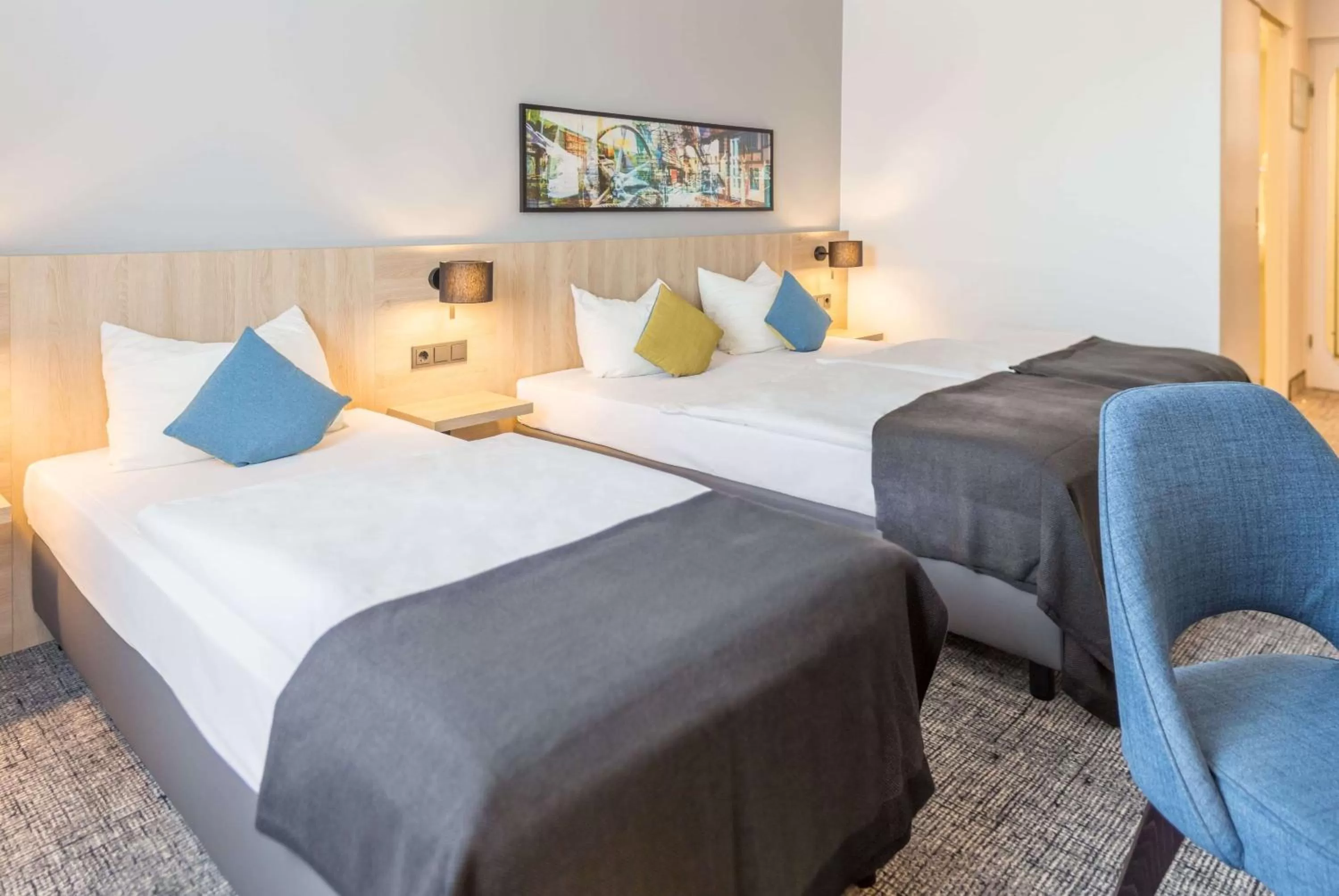 Photo of the whole room, Bed in Ramada by Wyndham Flensburg City