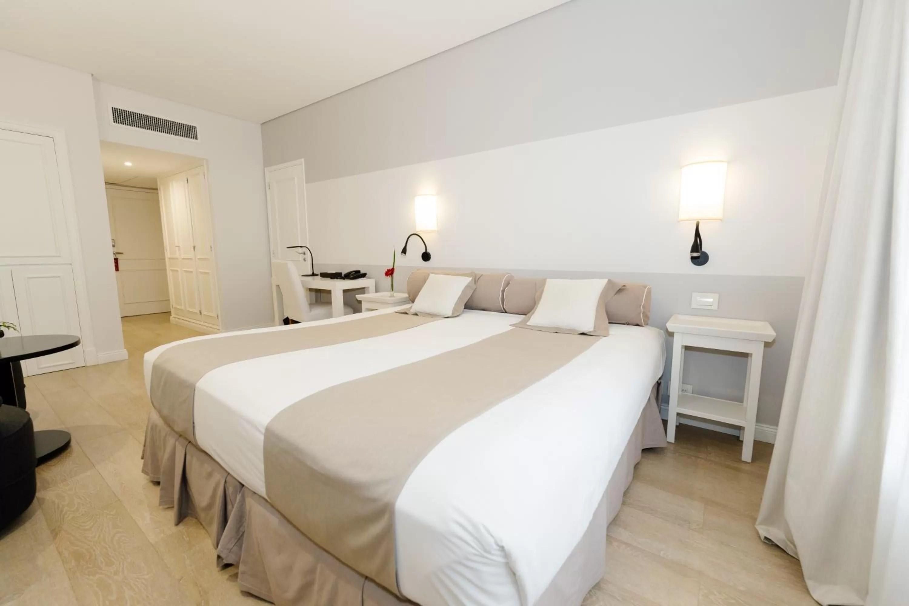 Bed in Loi Suites Recoleta Hotel