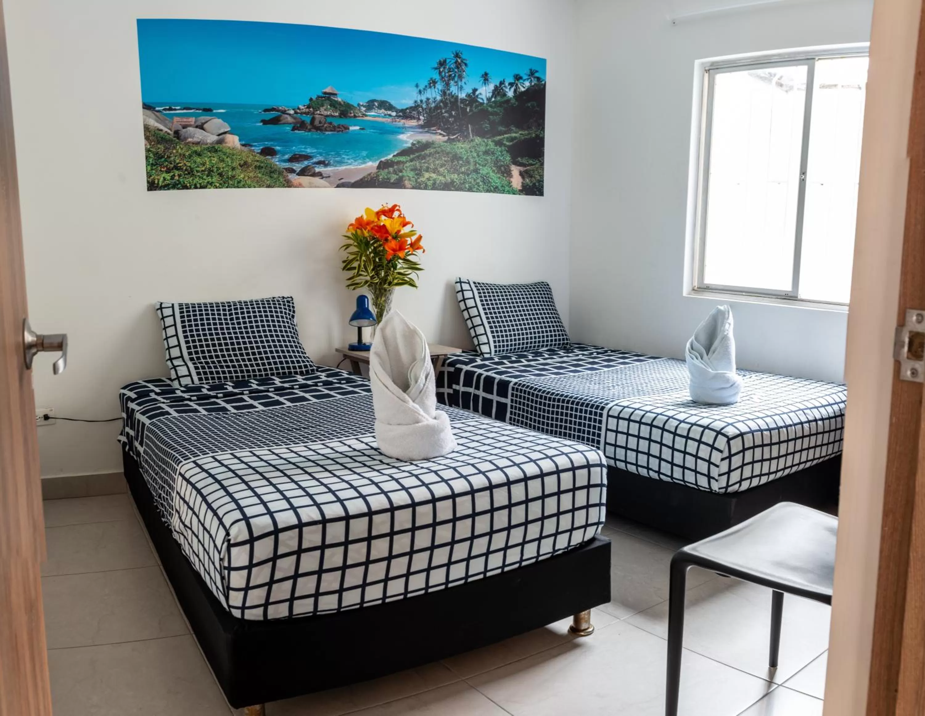 Photo of the whole room, Bed in Air Guest House