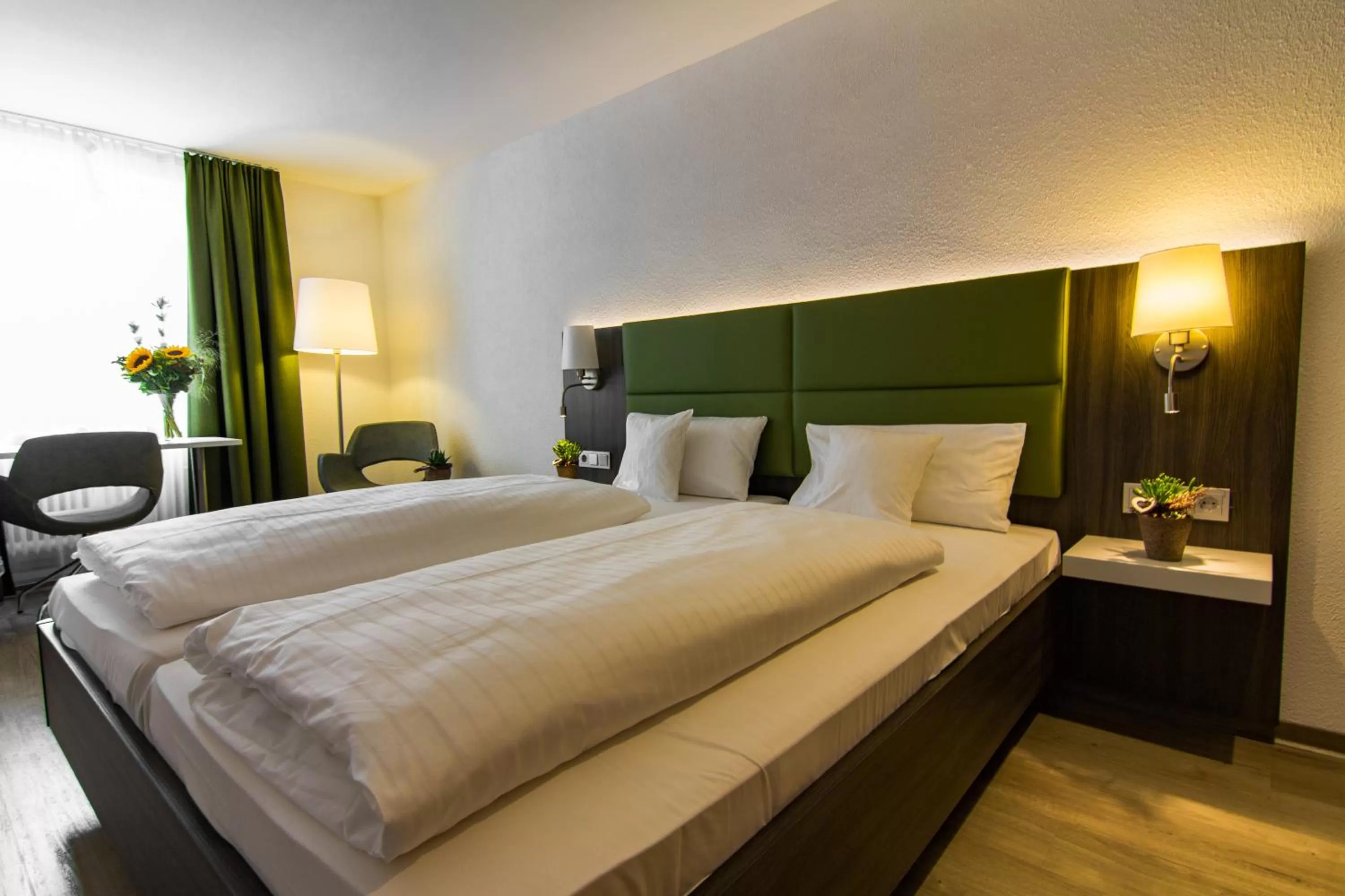 Photo of the whole room, Bed in Insel-Hotel-Lindau