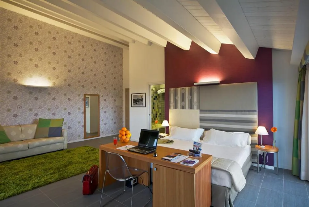 Bed in Poggio Del Sole Hotel