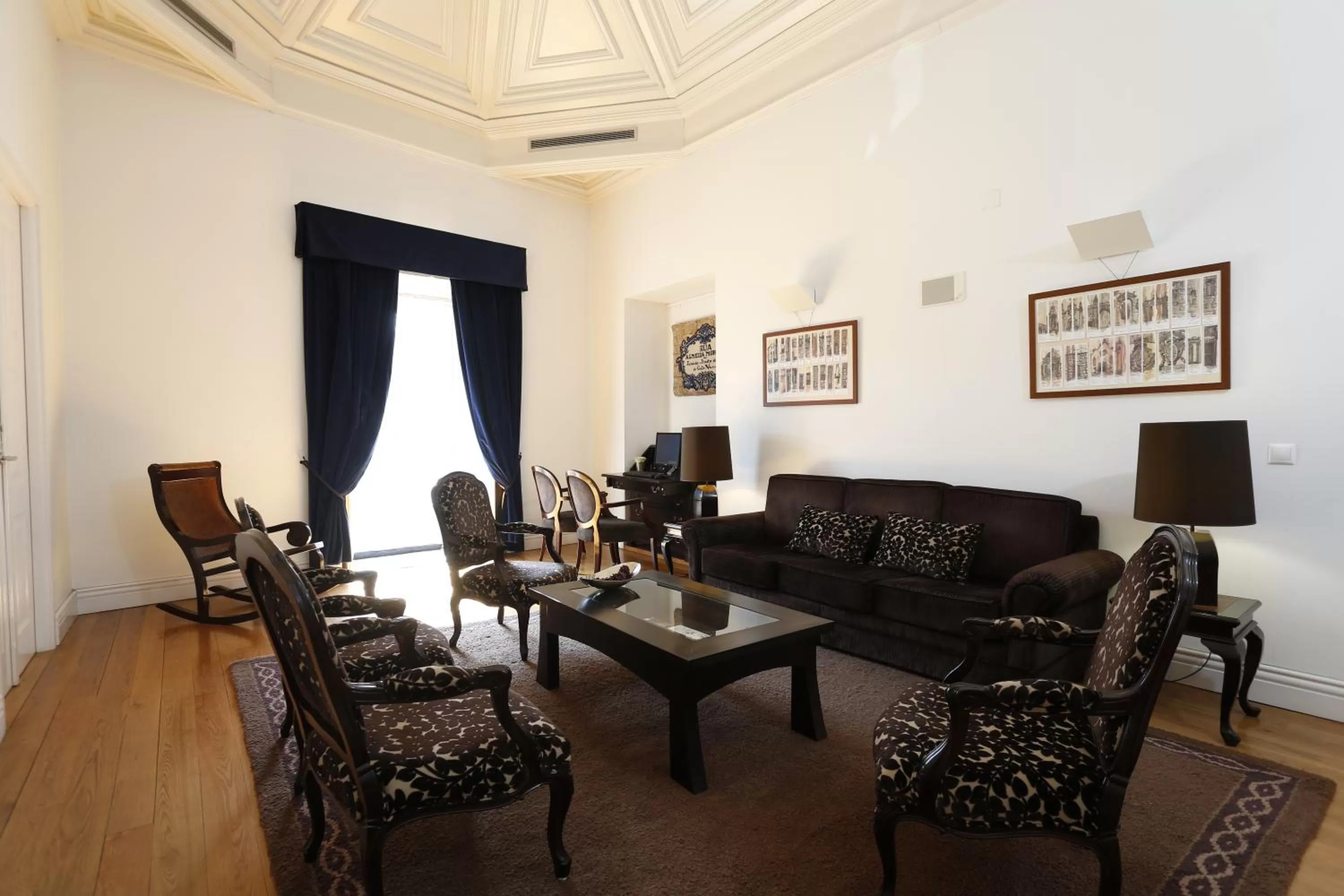 Communal lounge/ TV room in Montebelo Palácio dos Melos Viseu Historic Hotel