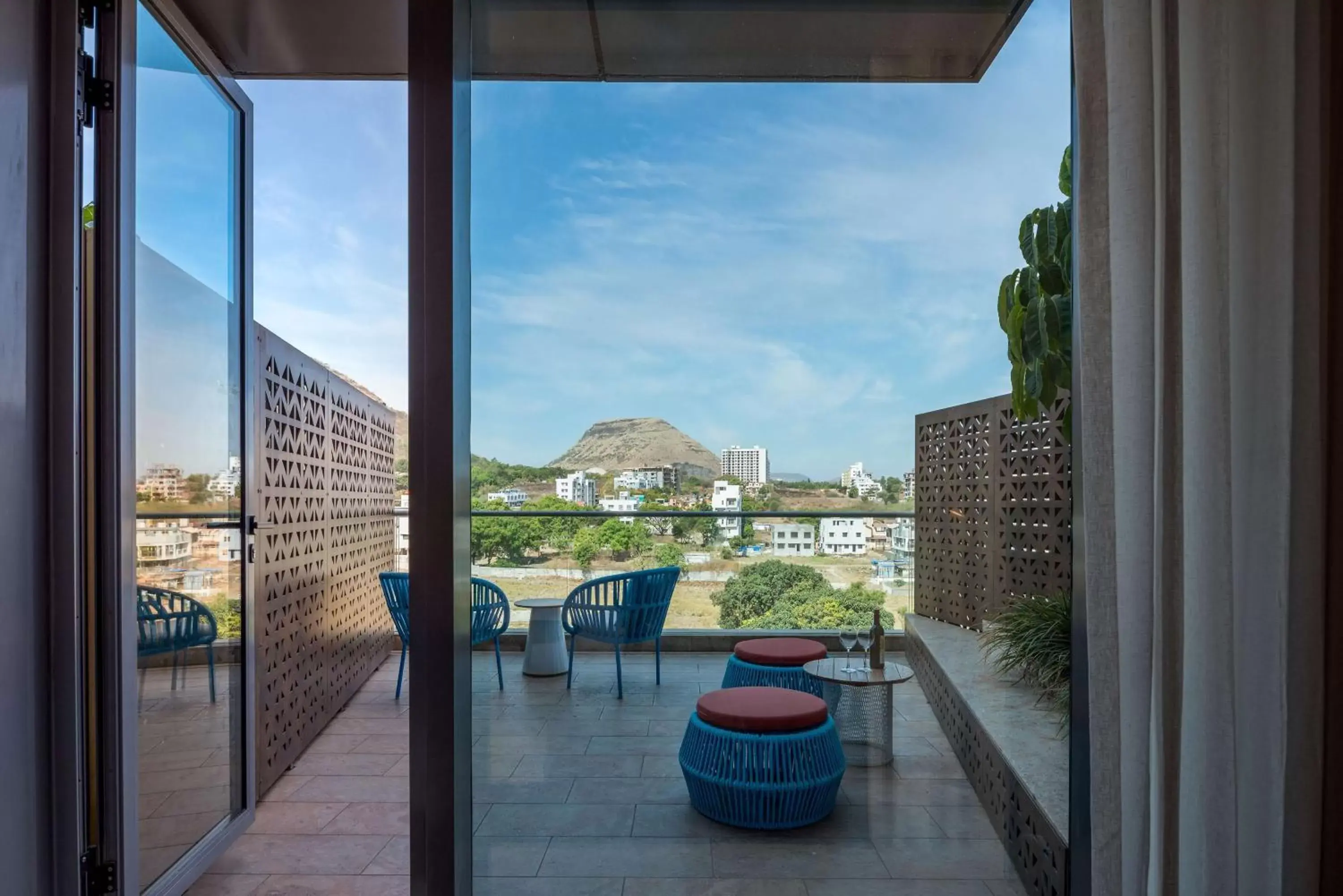 Deluxe Room with Balcony in Radisson Blu Hotel & Spa, Nashik Deluxe Room with Balcony in Radisson Blu Hotel & Spa, Nashik