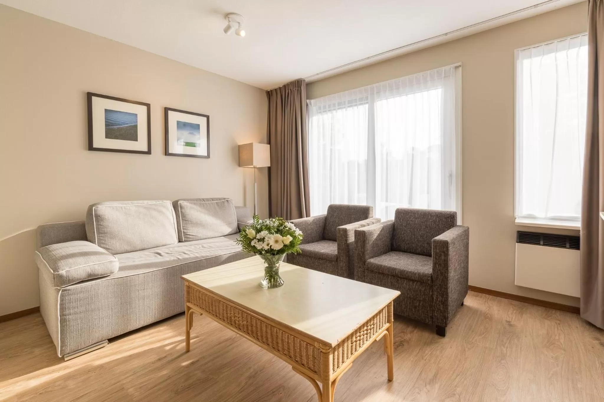 Seating area in Fletcher Hotel-Restaurant Amelander Kaap