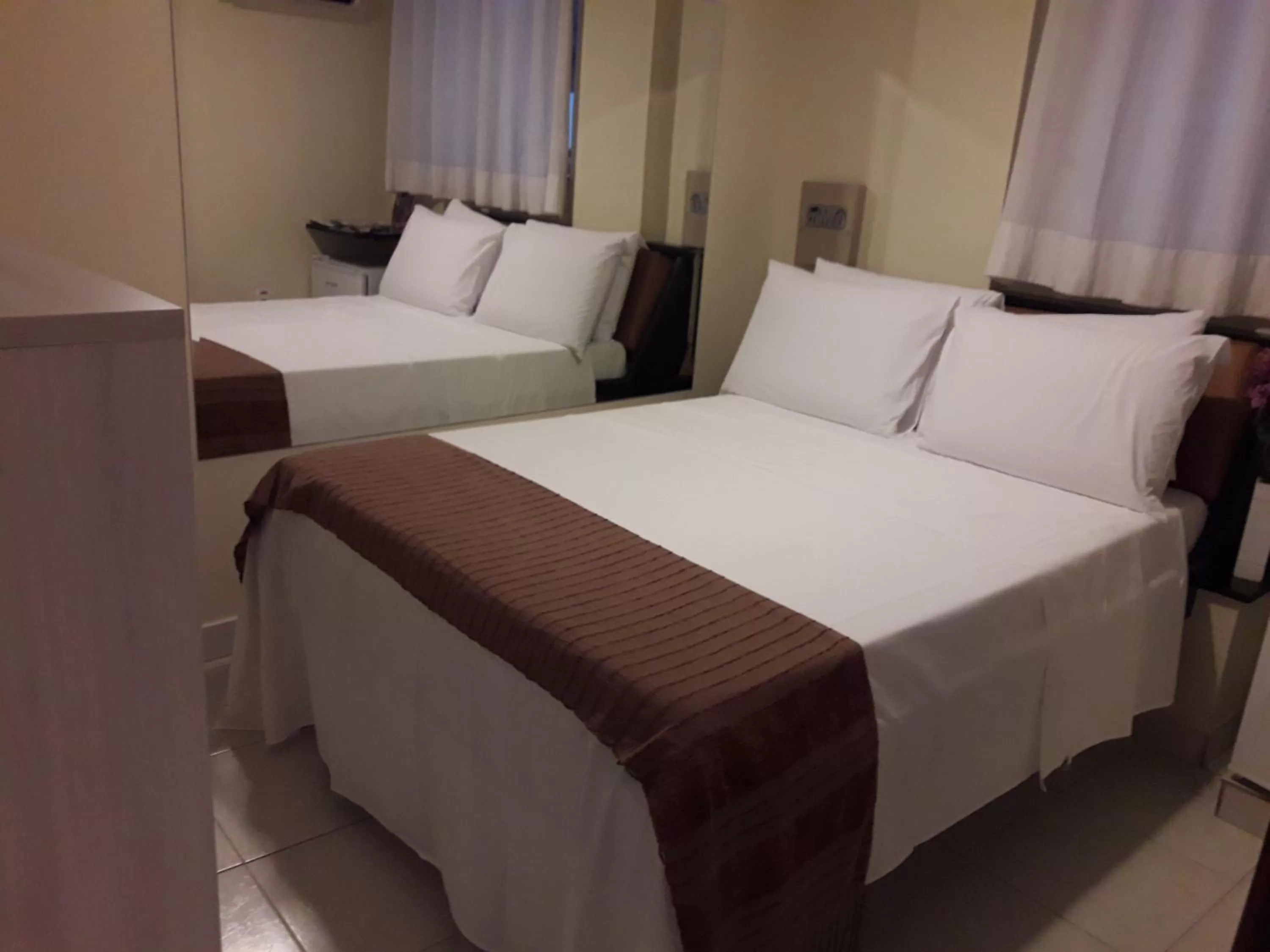 Bed in Hotel Sempre Executive