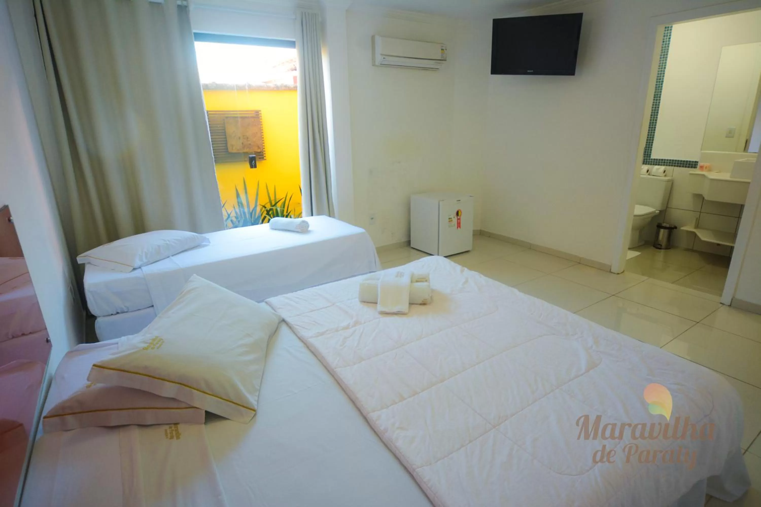 Photo of the whole room, Bed in Pousada Maravilha de Paraty