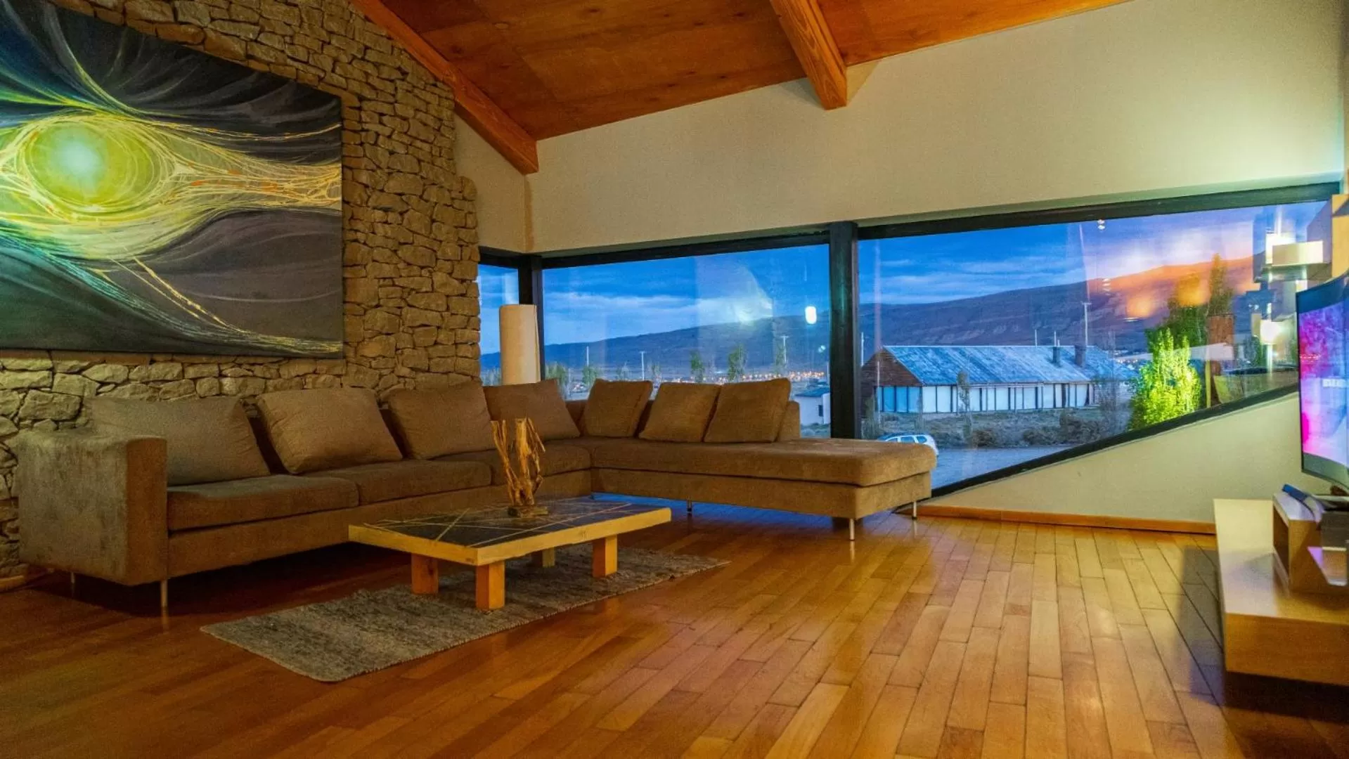 Communal lounge/ TV room in Design Suites Calafate