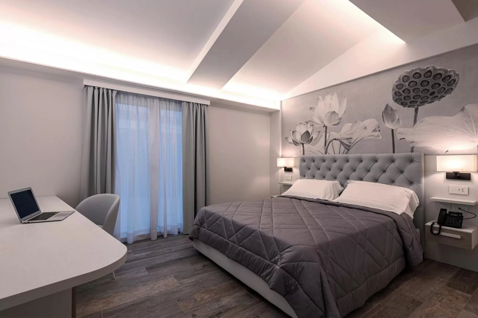 Photo of the whole room, Bed in Petit Hotel