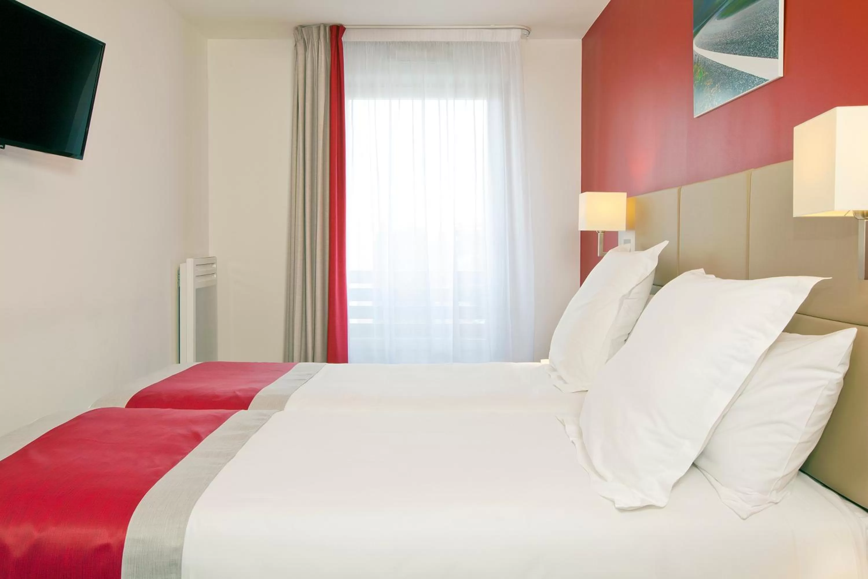 Bedroom, Bed in Séjours & Affaires Paris Bagneux